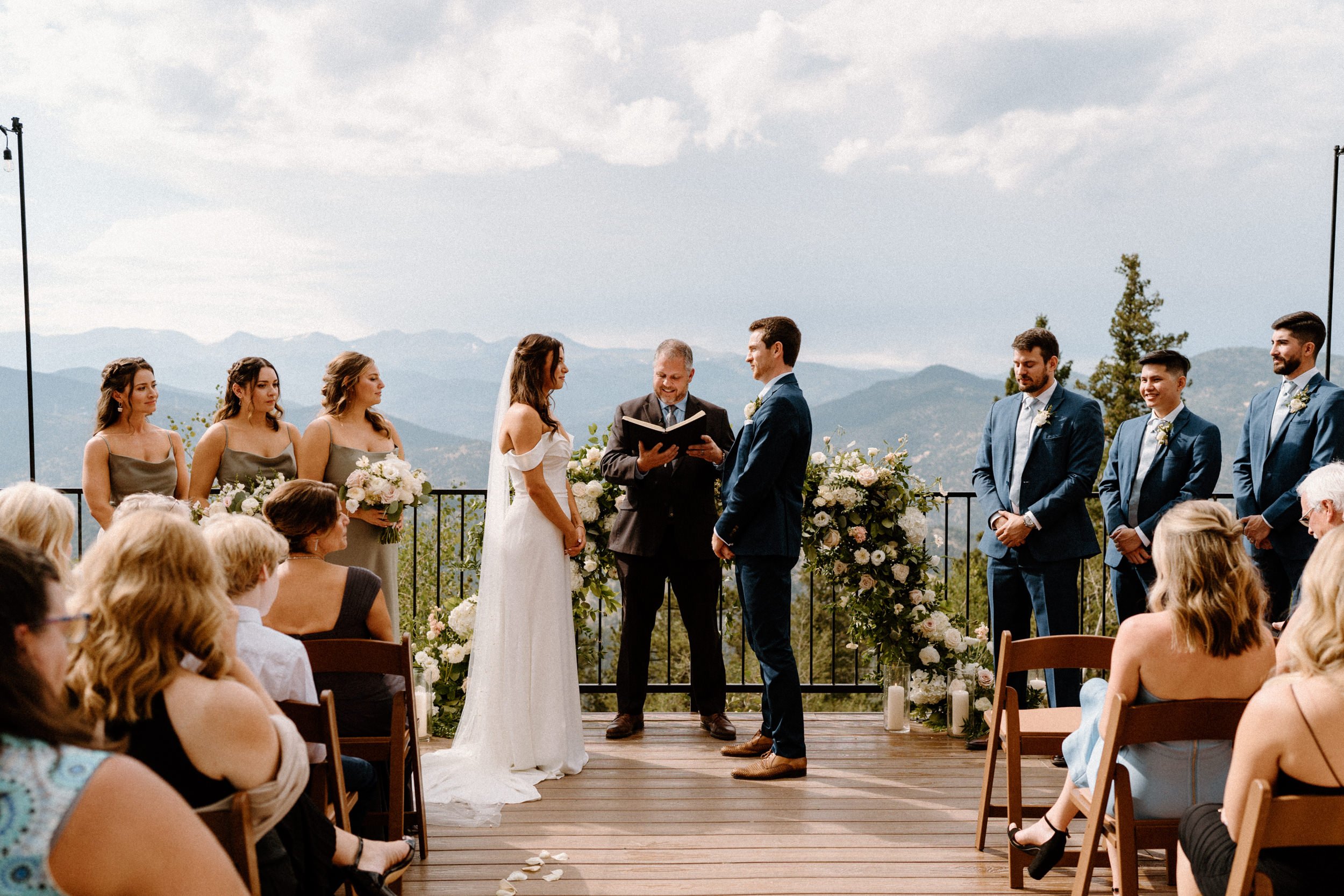 Bride and groom stand at the altar together at North Star Gatherings in Idaho Springs, CO