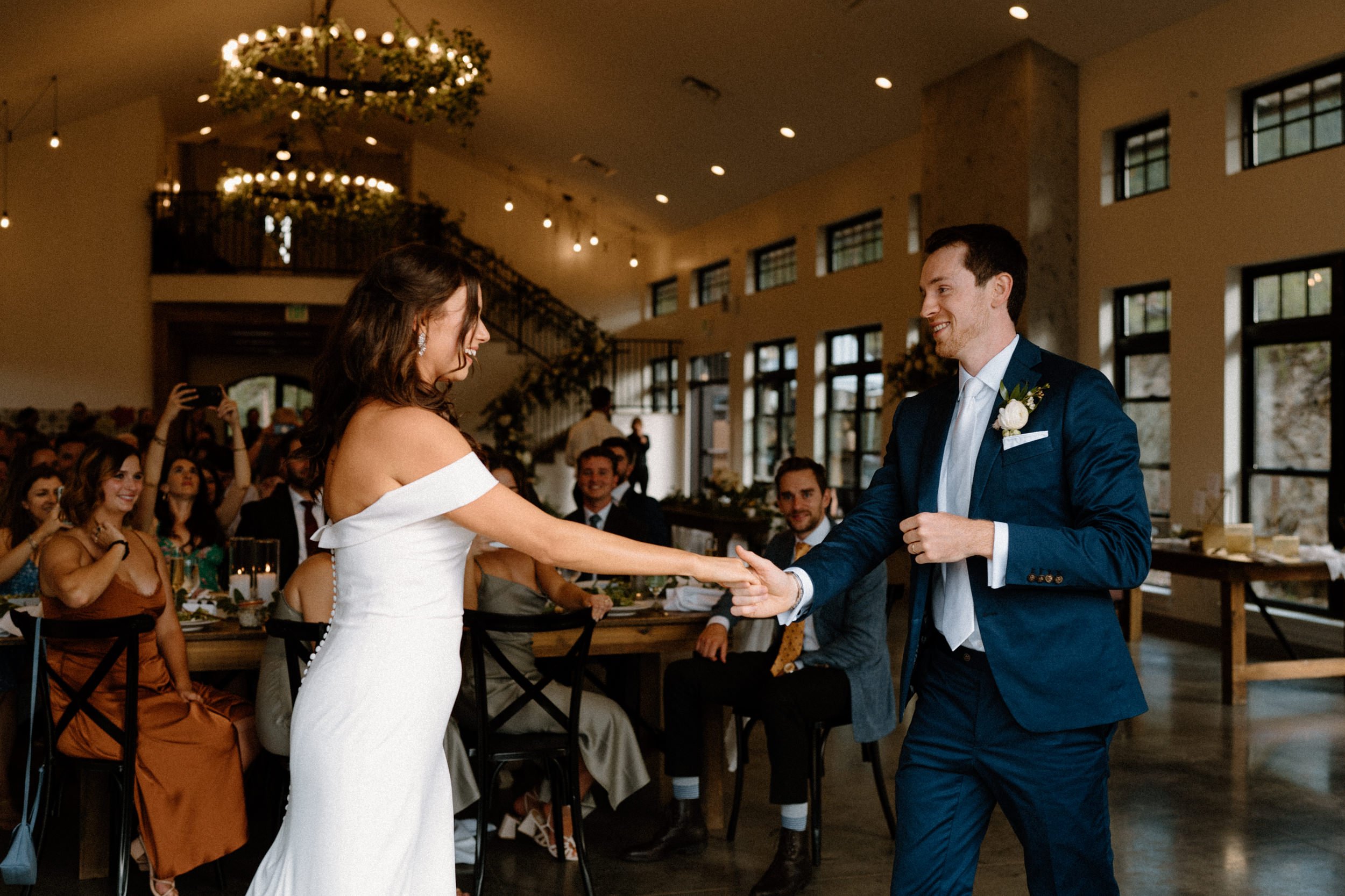 The bride and groom share their first dance at North Star Gatherings in Idaho Springs, CO