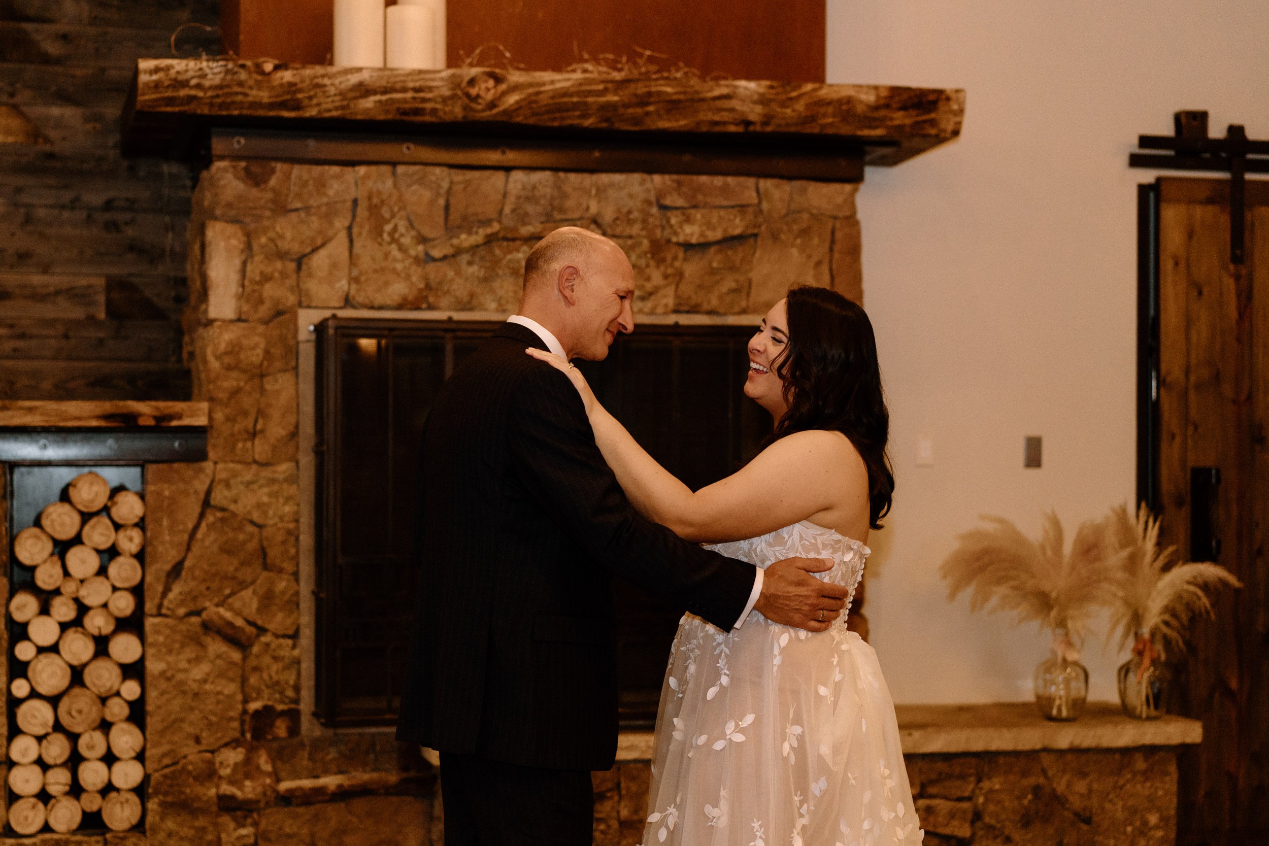 Bride and father dance during their father/daughter dance