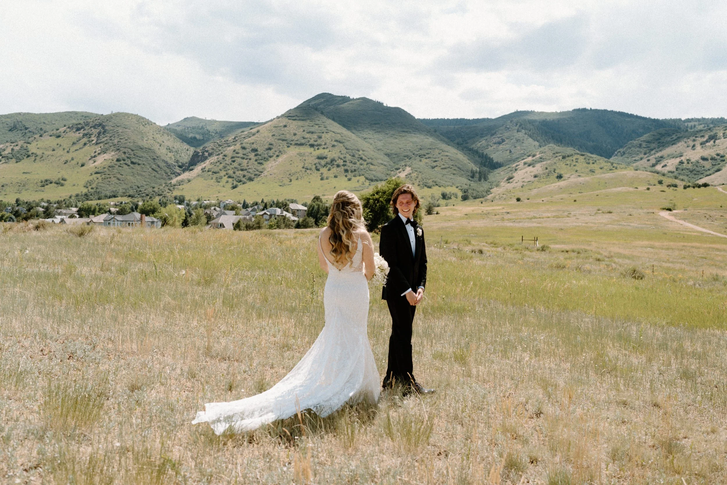 Groom turning around for first look on wedding day at The Manor House