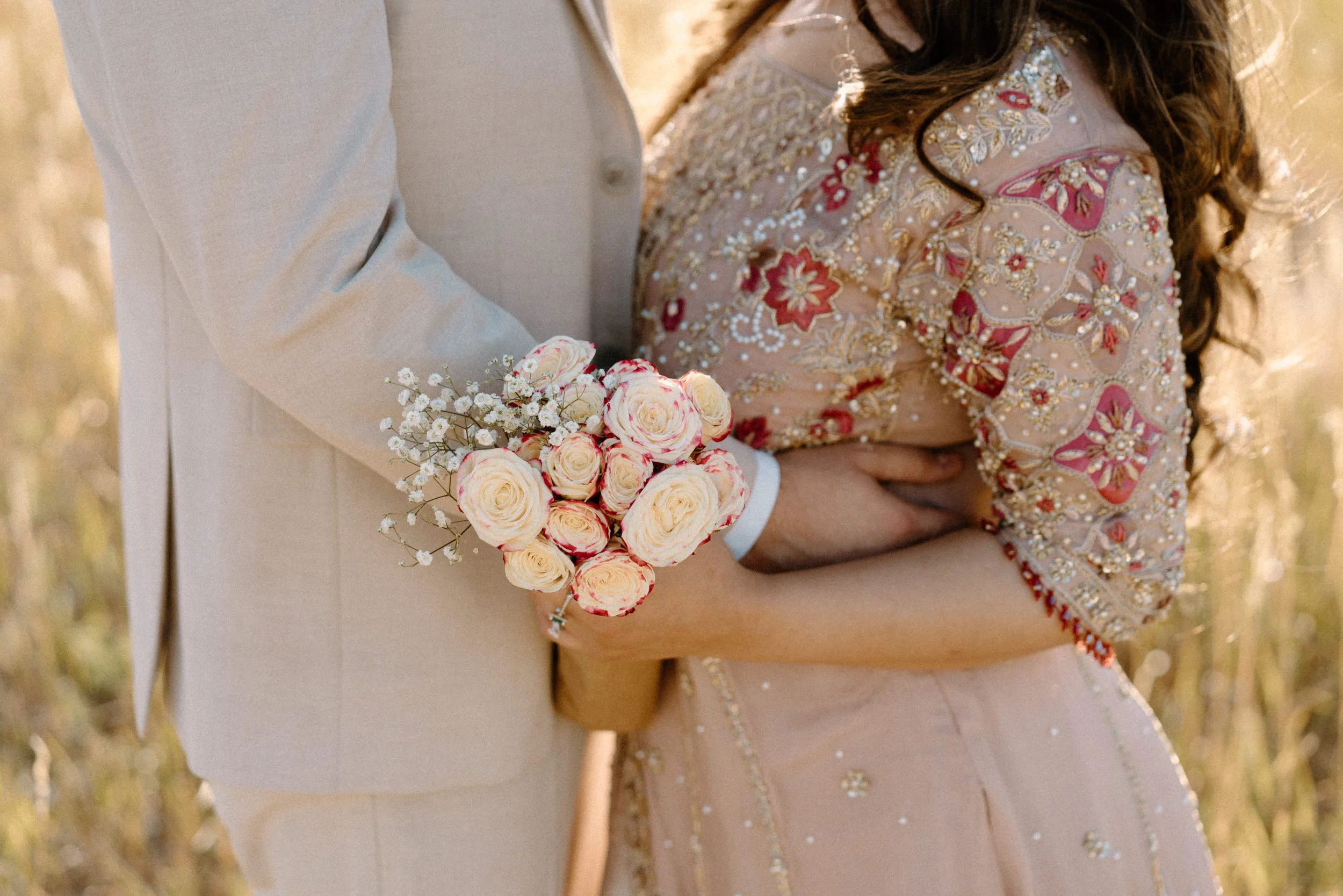Fiancée holding a bouquet during an engagement session in Boulder Colorado