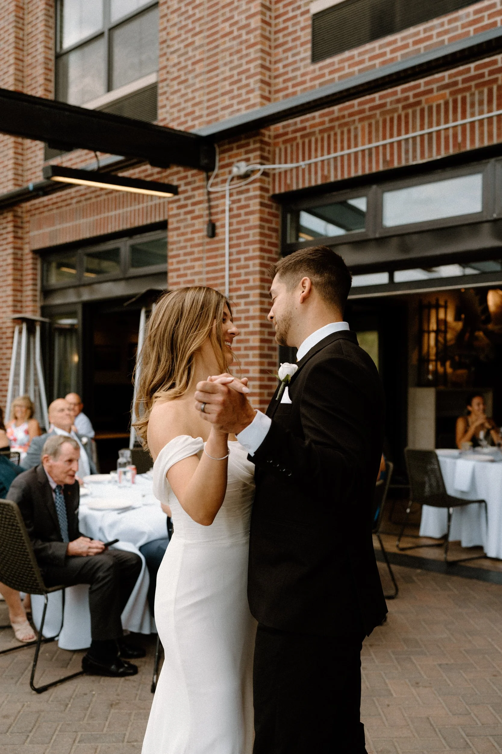 Bride and groom dancing during reception on wedding day at The Eddy in Golden Colorado