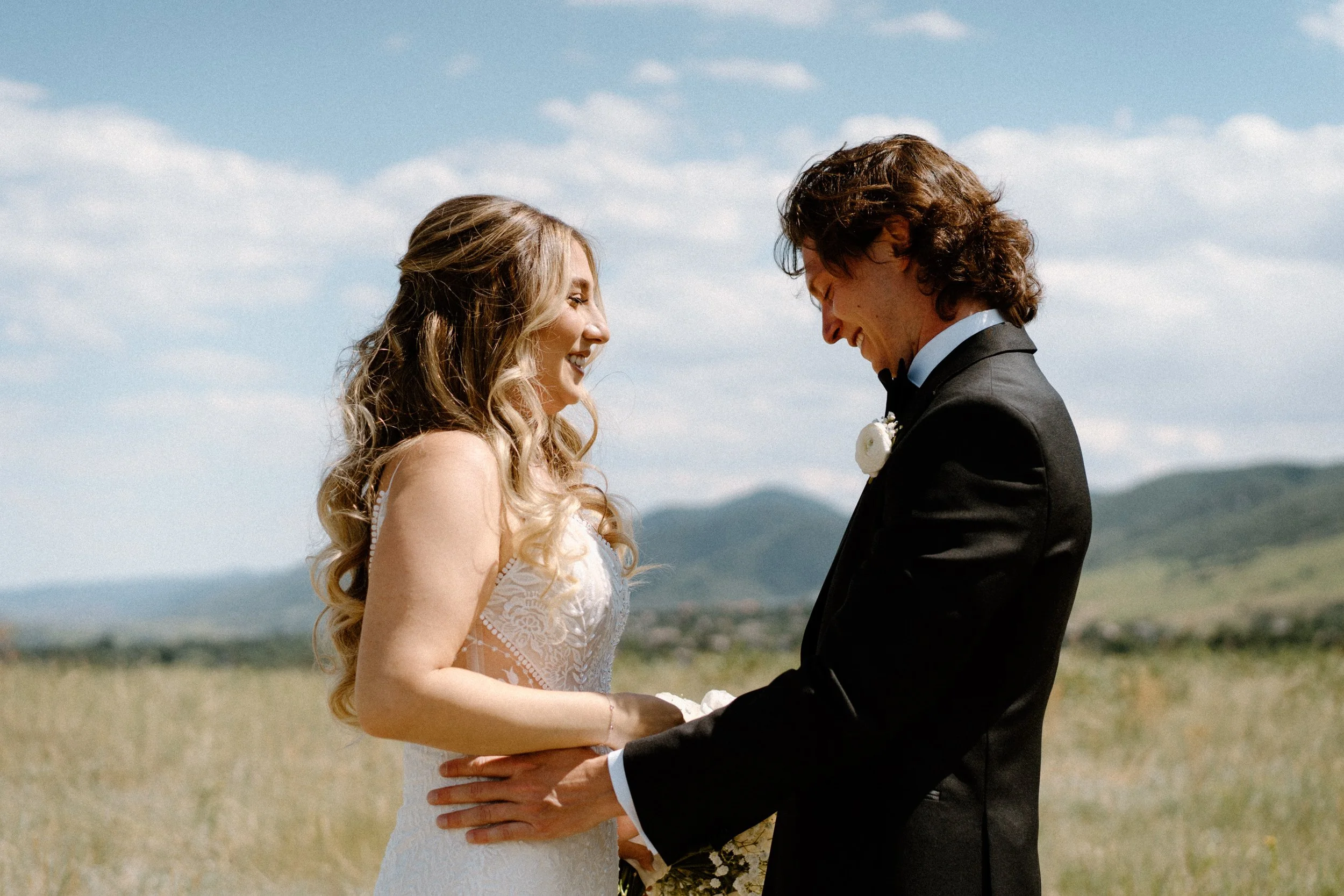 Groom admiring bride during first look on wedding day at The Manor House