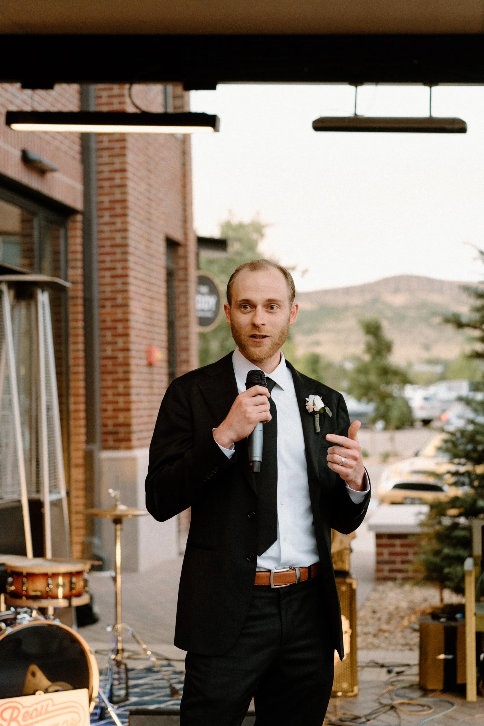 Groom's friend giving a speech on wedding day at The Eddy in Golden Colorado