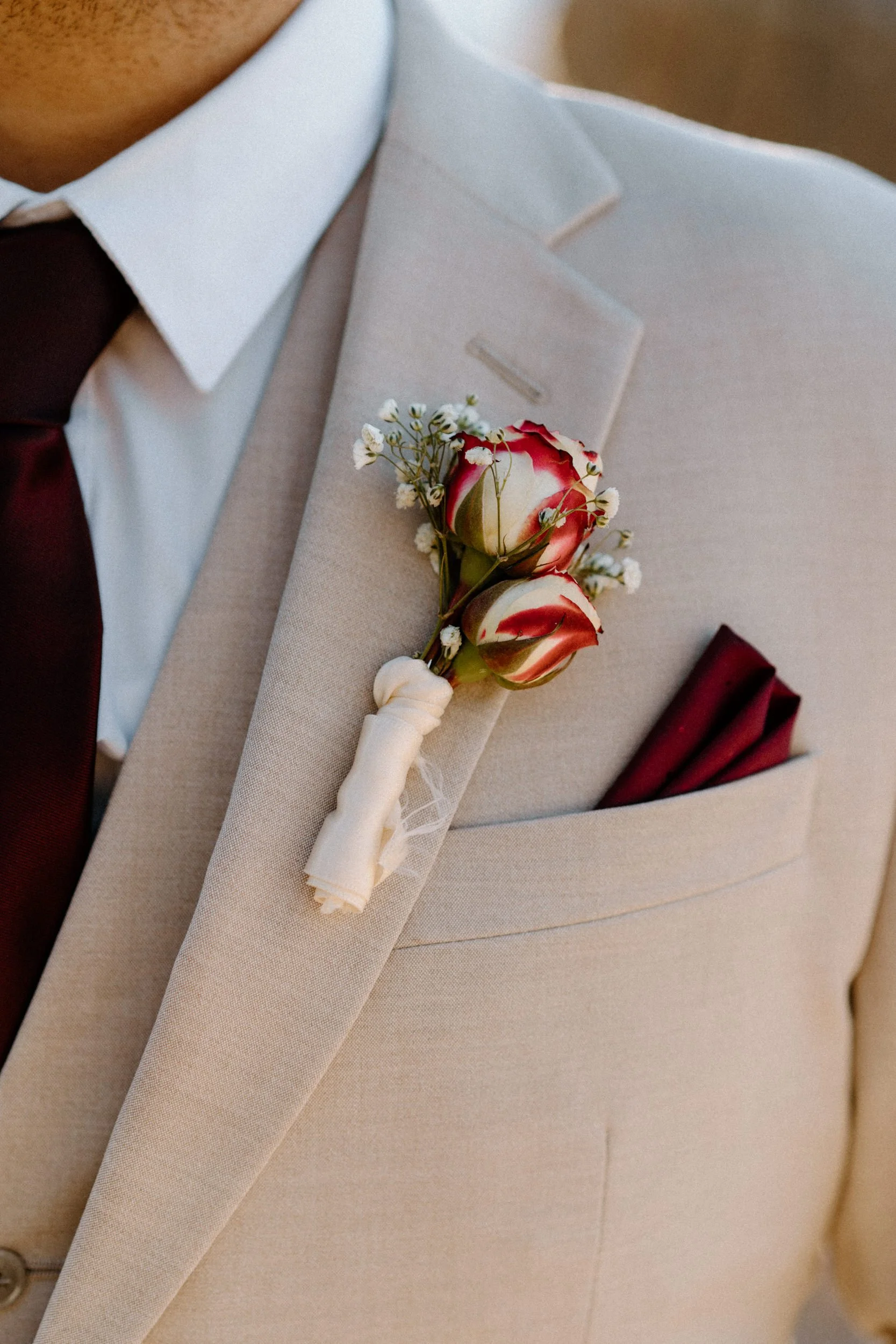 Fiancés boutonniere from an engagement session in Boulder Colorado
