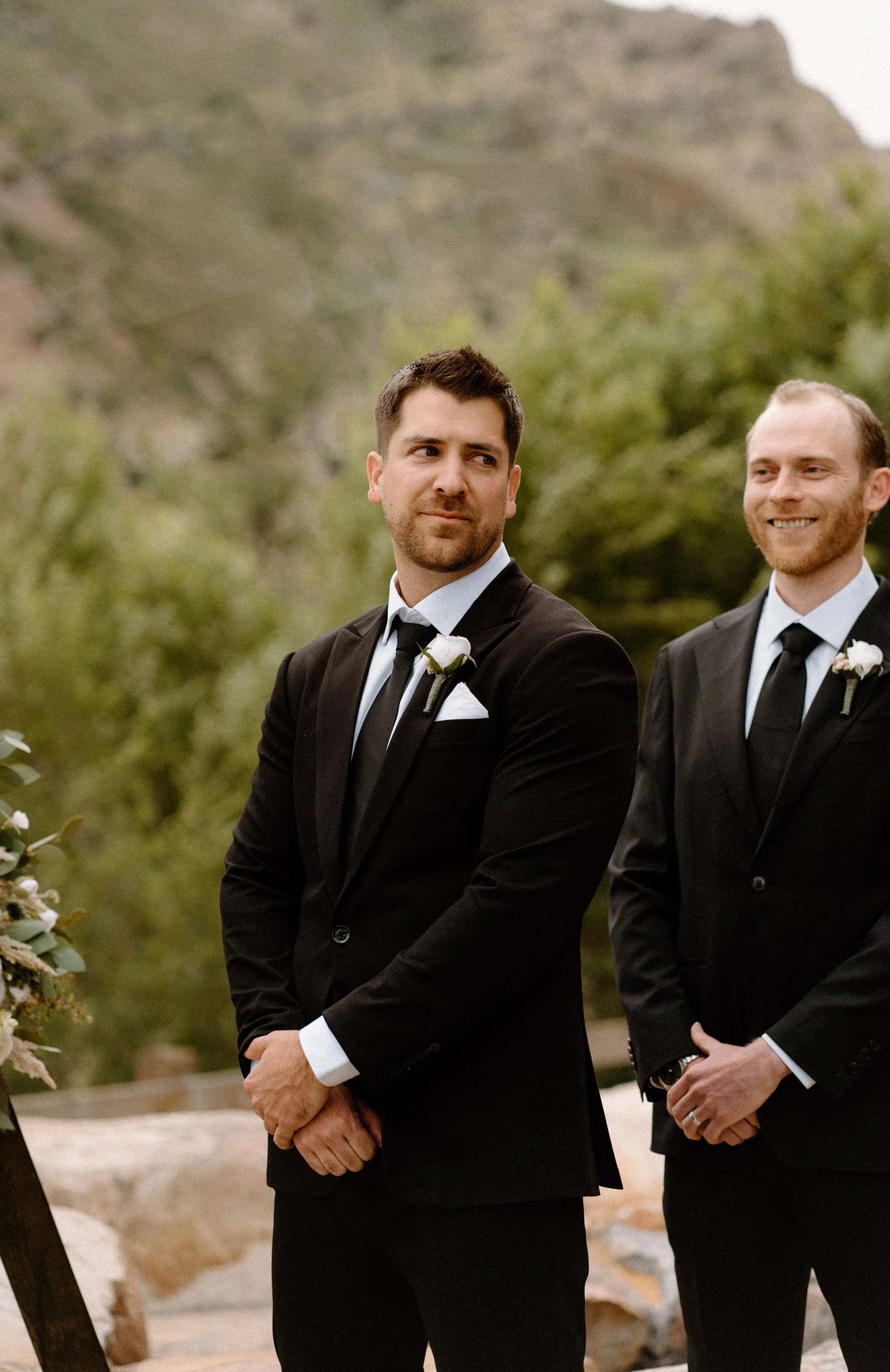 Groom watching bride walking down the aisle on wedding day at The Eddy in Golden Colorado