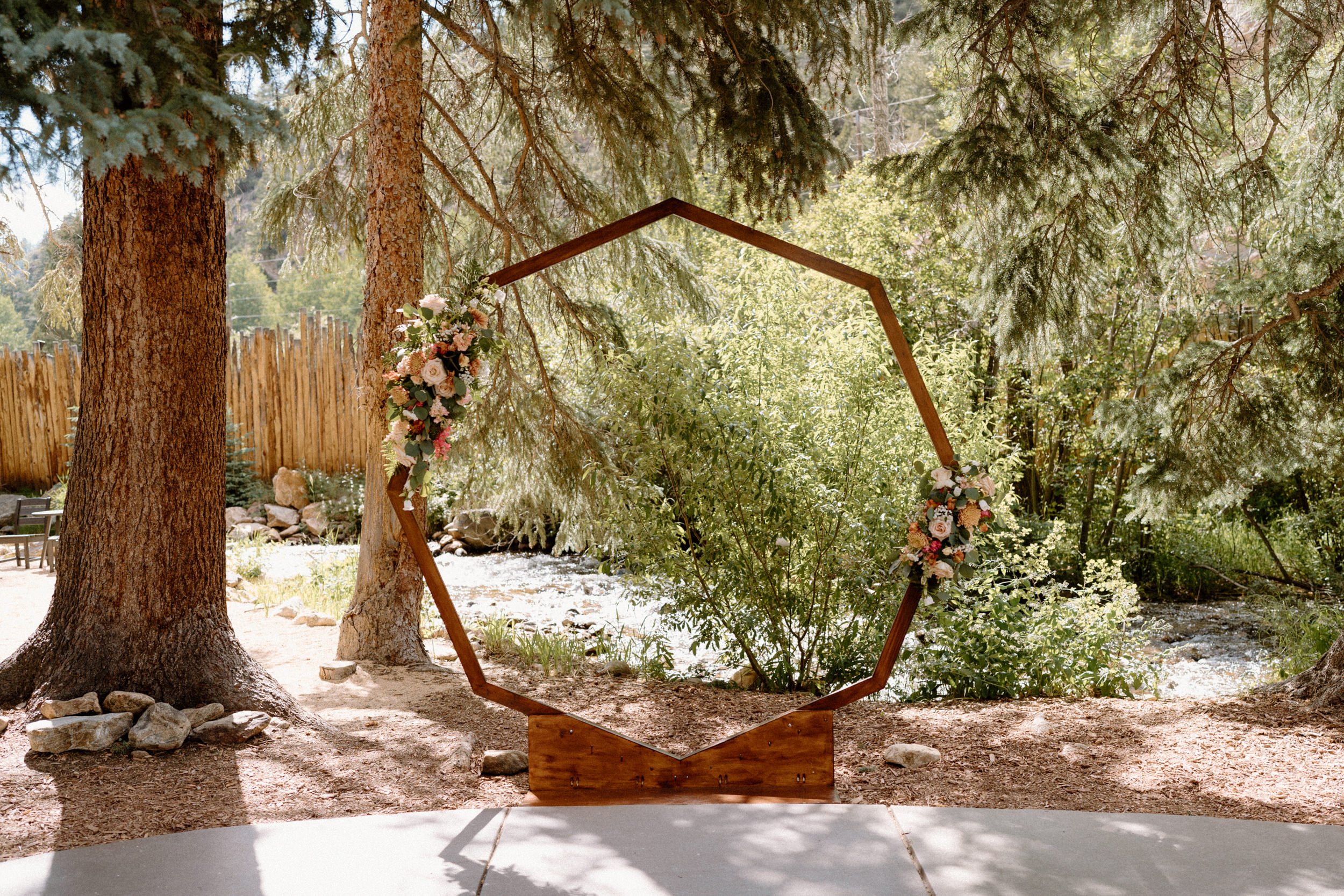 Bride and groom ceremony arch from a wedding at Blackstone Rivers Ranch