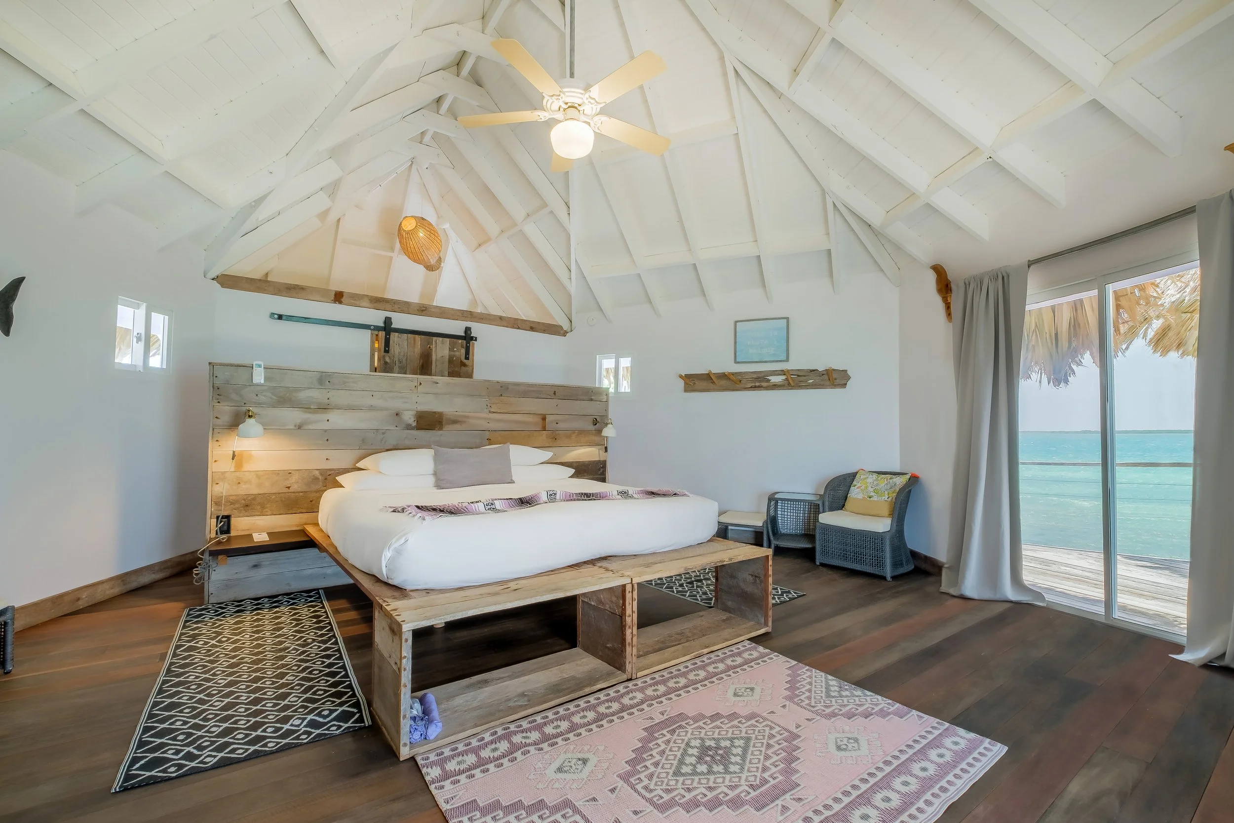 Thatch Caye Overwater Bungalow King Bed 2.jpg
