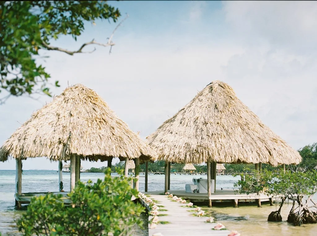 Thatch Caye Serenity Point Palapas.jpg