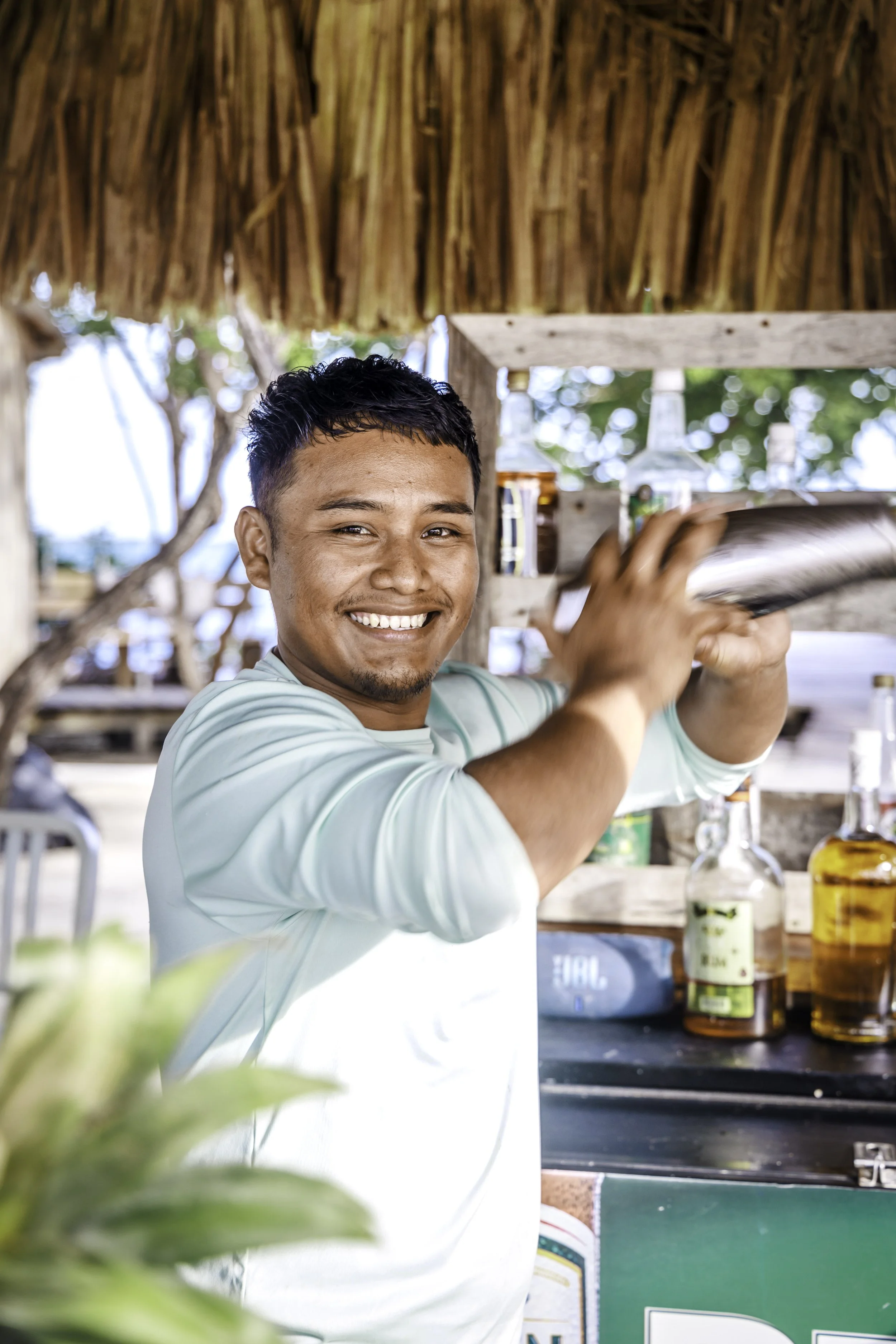 Thatch Caye Bartender.jpg