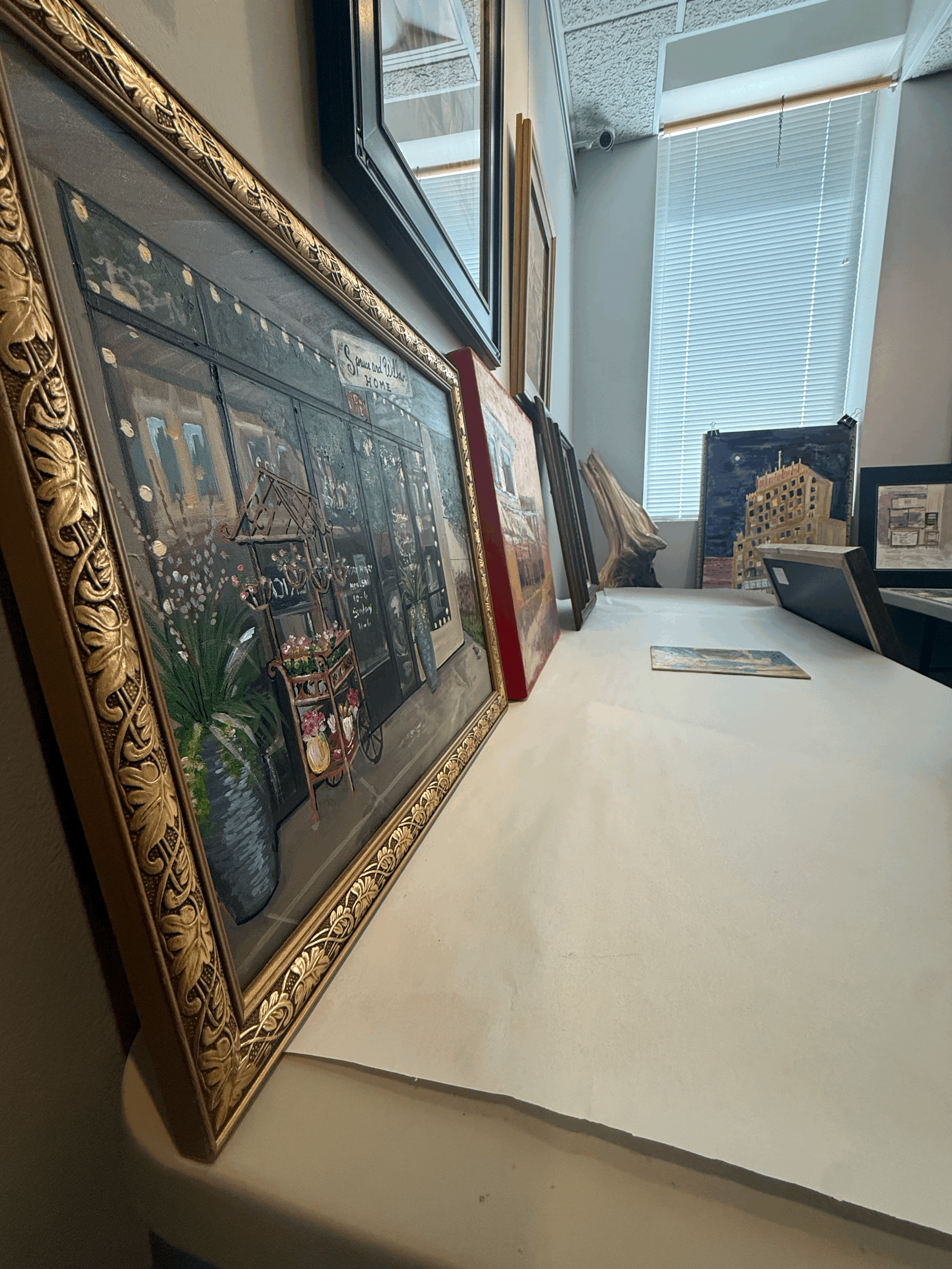  So many scenes of downtown decorated the backroom of the gallery! 