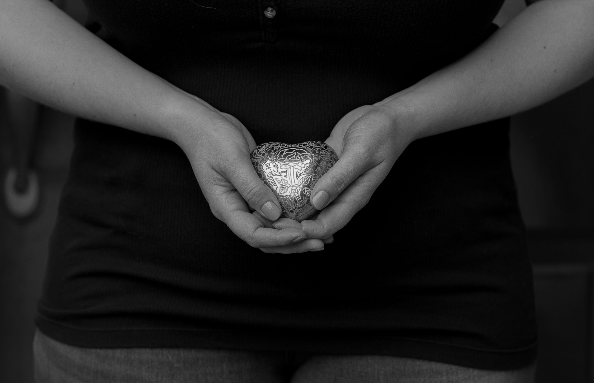 Imagine a love so strong it made saying hello and goodbye in the same day worth all the pain. My first pregnancy was easy and normal. All of those firsts were so exciting and despite the constant morning sickness, nothing was better than hearing my baby's heartbeat and watching my belly grow. When I found out I was pregnant with our second baby, things felt different. I told myself it was just normal second pregnancy nerves. I felt nervous about having another baby and taking time away from my first, and wondered if I would love this baby as much as my first. It turns out this sweet girl taught me more about love than I ever imagined. My second pregnancy started pretty normal. The excitement of seeing the heartbeat for the first time never gets old and I remember the feeling of relief I had when we finally heard the heartbeat at 14 weeks. The next few weeks progressed normally and we even starting feeling our sweet baby kick. At 18 weeks, during our anatomy scan, we found out we were having another girl! But we also found out that she'd be born with a rare and complex congenital heart defect. The next couple of weeks were spent meeting with specialists and other heart families while we tried to gather as much information as possible about what would happen when she was born. We didn't question the possibility of not making it through the pregnancy. One day shy of our 23rd week, our baby girl's heart stopped beating, and two days later I delivered our beautiful, sleeping angel. The physical pain of labour was nothing compared to the heartbreak we were feeling. Never in a million years did I think I would be choosing a funeral home in between contractions or having to decide if I wanted to hold and take pictures of my baby knowing I'd never get to hear her cry. The hardest thing I've ever done is walk out of the hospital without my baby, knowing the next time I see her will be when we go to pick out an urn. I remember my milk coming in 2 days later like a giant slap in the face, feeling so broken and so alone. Everything was different after that. So many of my relationships changed, some for the better and some completely disappeared. Not a day has gone by where I haven't thought about her or wondered what her laugh would sound like. Since her passing, we have had her baby sister and I truly feel blessed to have my girls, but I'll forever grieve the daughter I never got to know. Every milestone, holiday, and adventure I find myself wondering why she couldn't be here too. Grief is hard. But as hard as all of this has been, I'm incredibly grateful she chose me to be her mom. She has taught me so much about myself and has shown me strength I never imagined. Because of her I have a deeper understanding of gratitude and living with purpose, and never again will I question the amount of love I have in me. -Jenna