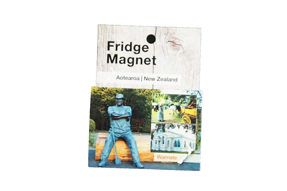 Fridge Magnet. 7cm x 5cm. Bushman statue with historical inserts. $3.50