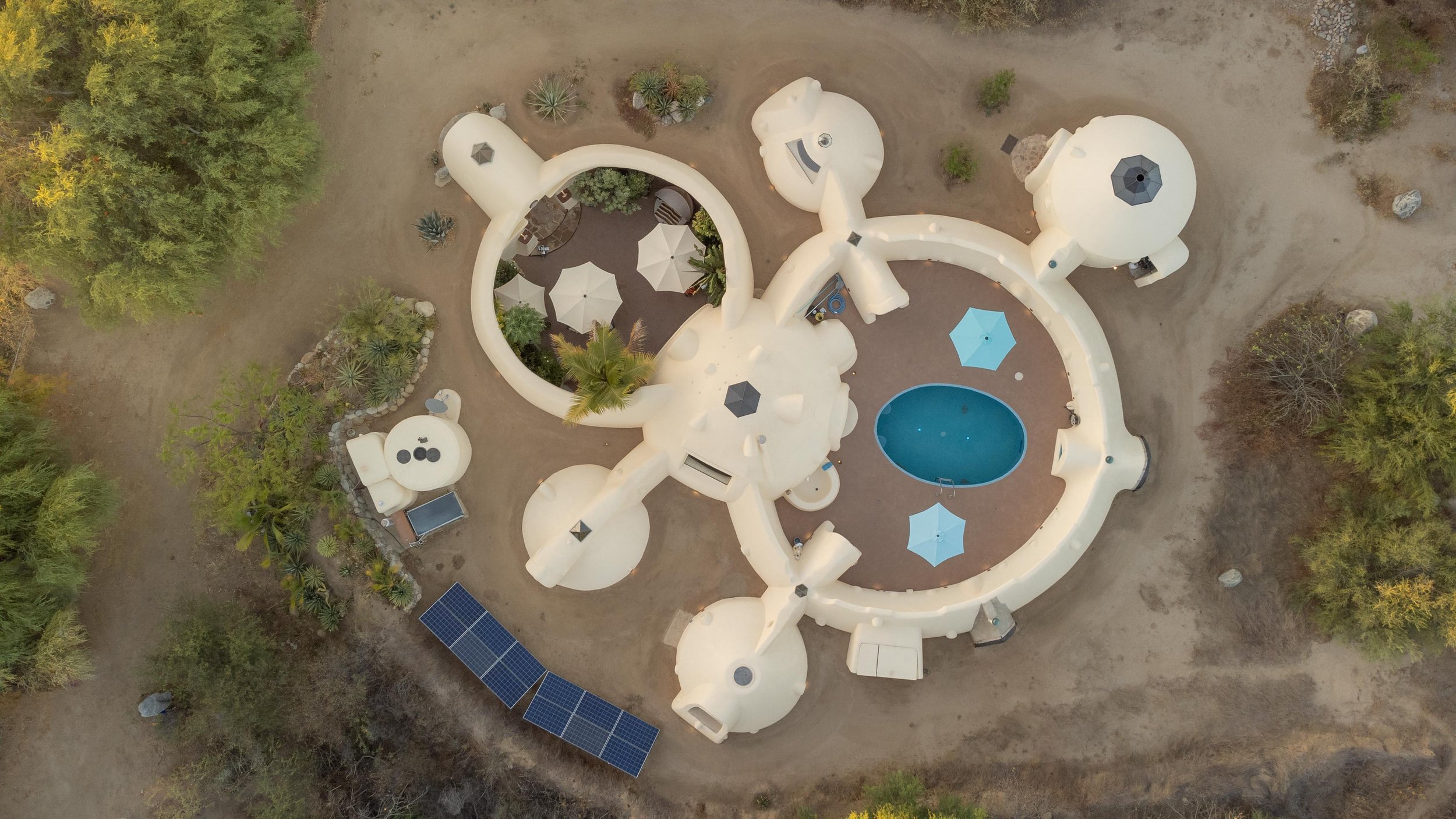  drone image looking down at a dome home in Mexico 