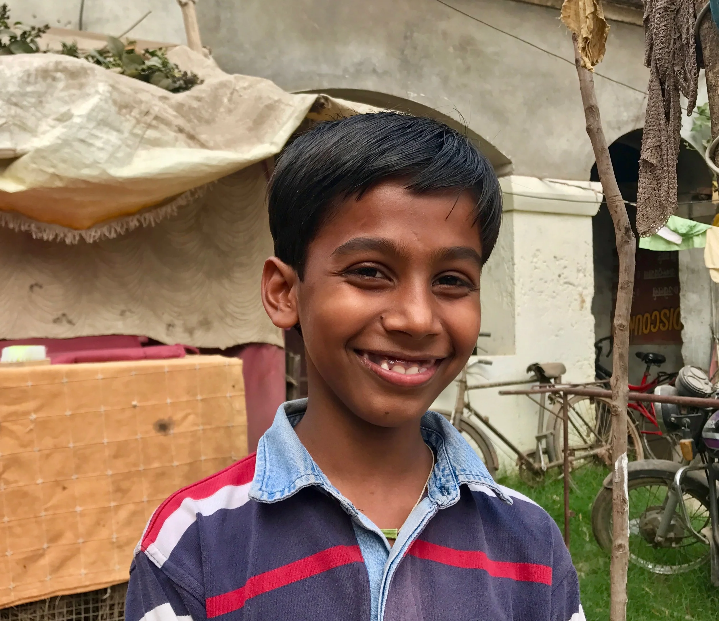 "My name is Akash. I was 5 years old when I joined school. I go to school everyday because I get to learn new things and when foreigners come from afar and teach me things, it’s fun and intriguing. At Anjali, I learned to always study well and be good to others. I learned not to steal nor abuse anyone. I learned to solve problems and English too and many other things. I also love to type and draw on the computer. I can do anything for my education. My mom and my dad are both very hard-working. I get my courage from my parents. My mom always keeps me motivated and gives me hope. I don’t want to do anything for myself. As soon as I become something, I won't let my parents to continue to live and work in these conditions. I want to keep my books safe and close to me. I can never give up my studies. In 10 years, I will be an engineer. I want to design and create self-driving cars and robots."