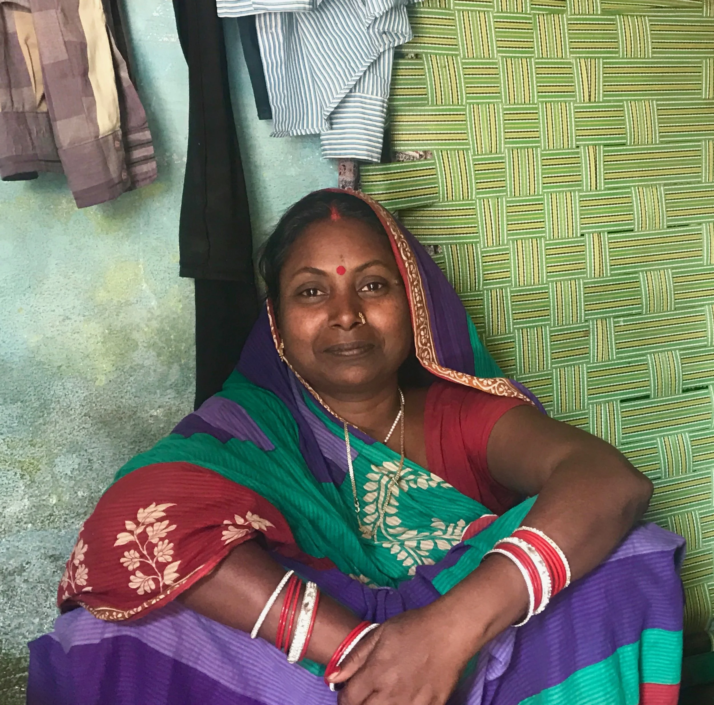 "We are from Ballia. We moved here 10 years ago. My husband was not well. We came to Varanasi for his medication, and spent what little money we brought with us from our village. So for 3 years, I worked as a maid in different houses so my husband could receive his treatment. For 3 years, I was the woman of the home. I financed everything and slowly his health improved. Both of us started working, and when we were able to save some money, we sent our children to school. When he was not well, I never lost hope. I prayed that I would work to feed my husband and children. I would never mistreat my husband nor let him feel dejected. I would tell him not to cry. He used to cry a lot, and still I did not lose hope. I had a lot of power. I was never unhappy. I always told him not to worry. I told him that I would always be with him."