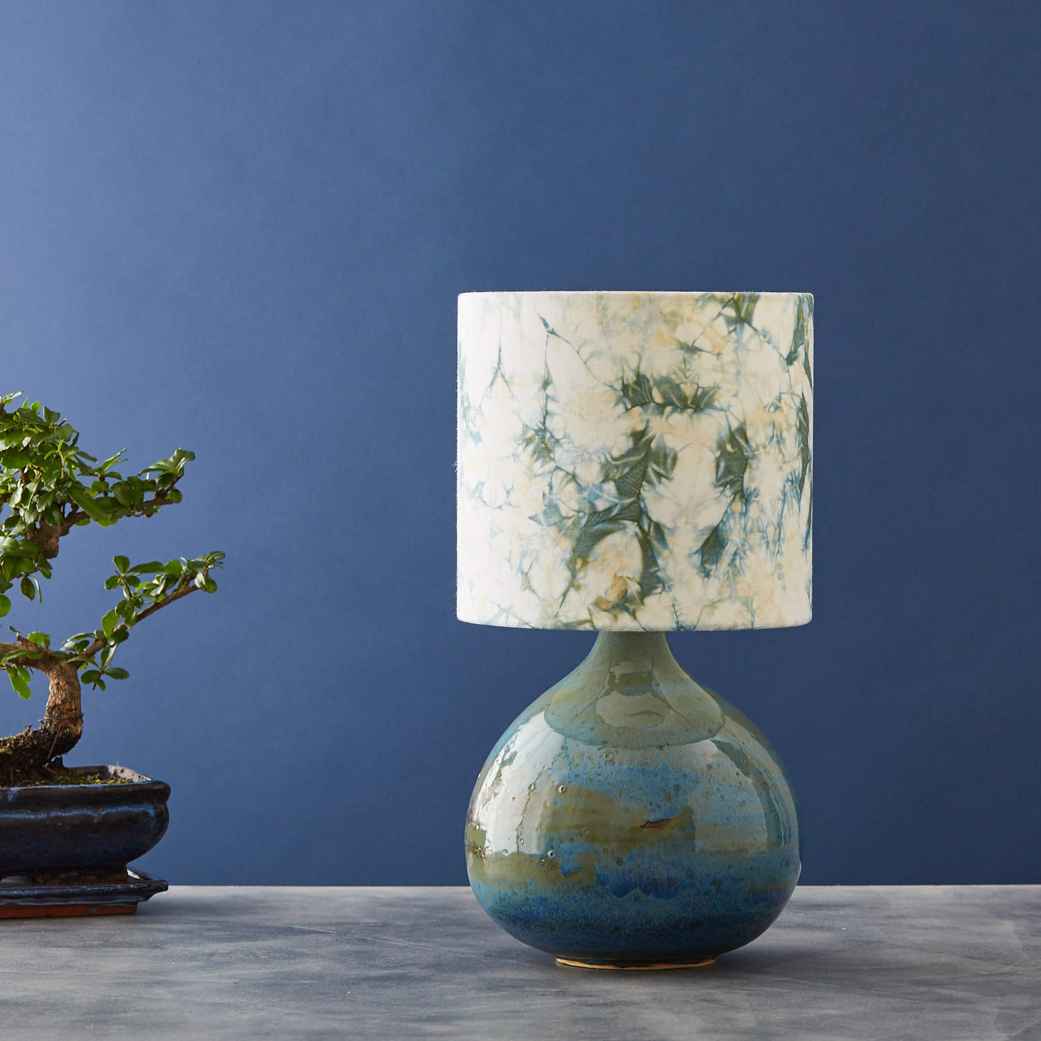 Teal green and gold bomaki shibori lampshade - table lamp unlit