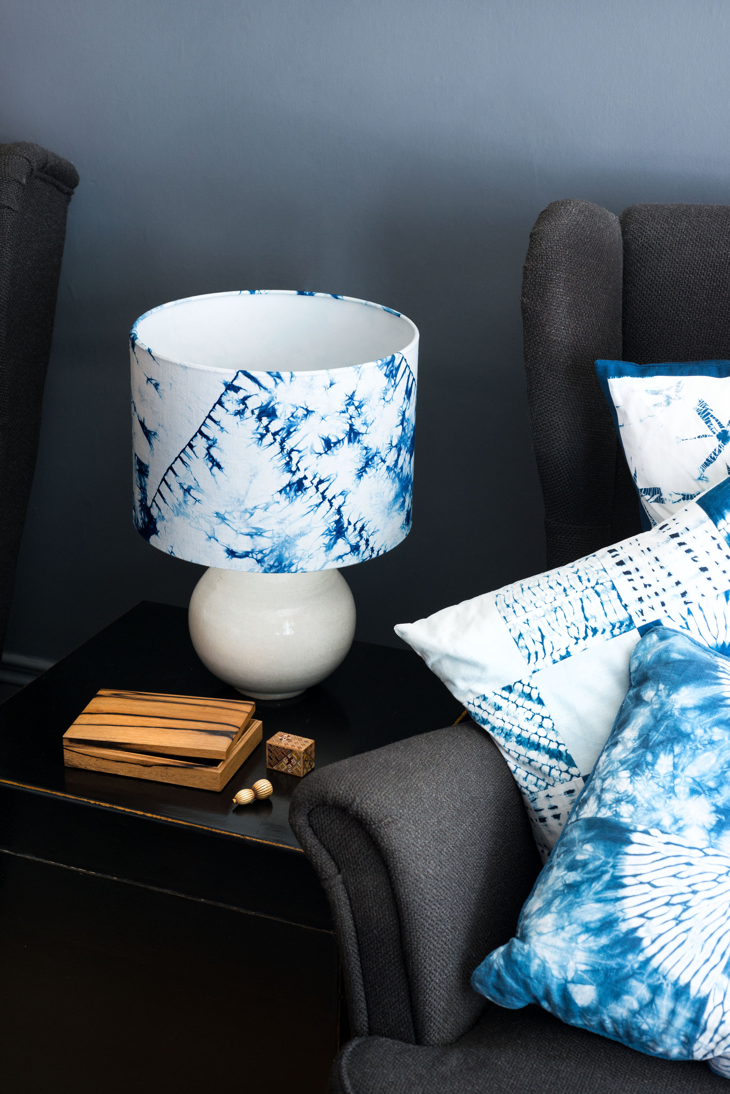 Indigo blue and white orimaki shibori lampshade - living room unlit