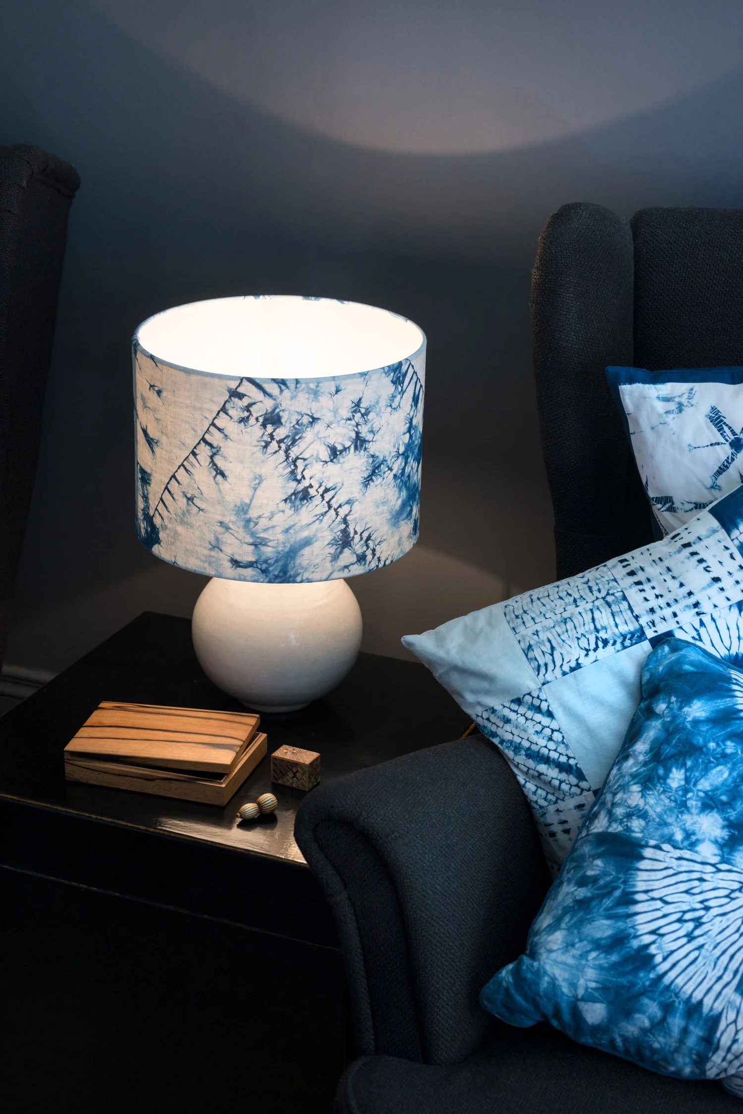 Indigo blue and white orimaki shibori lampshade - living room lit