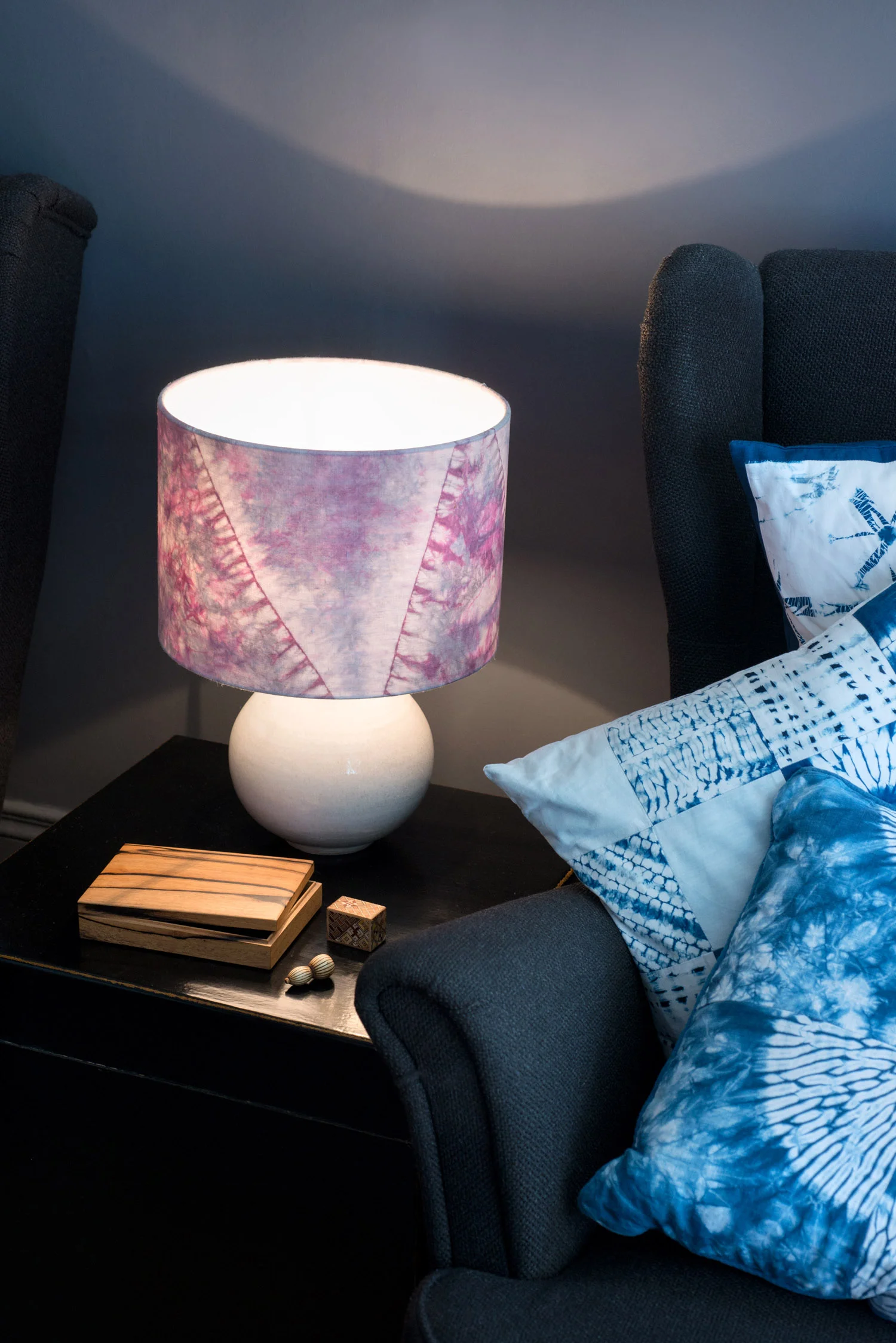 Pink, grey and white orimaki shibori lampshade - living room lit