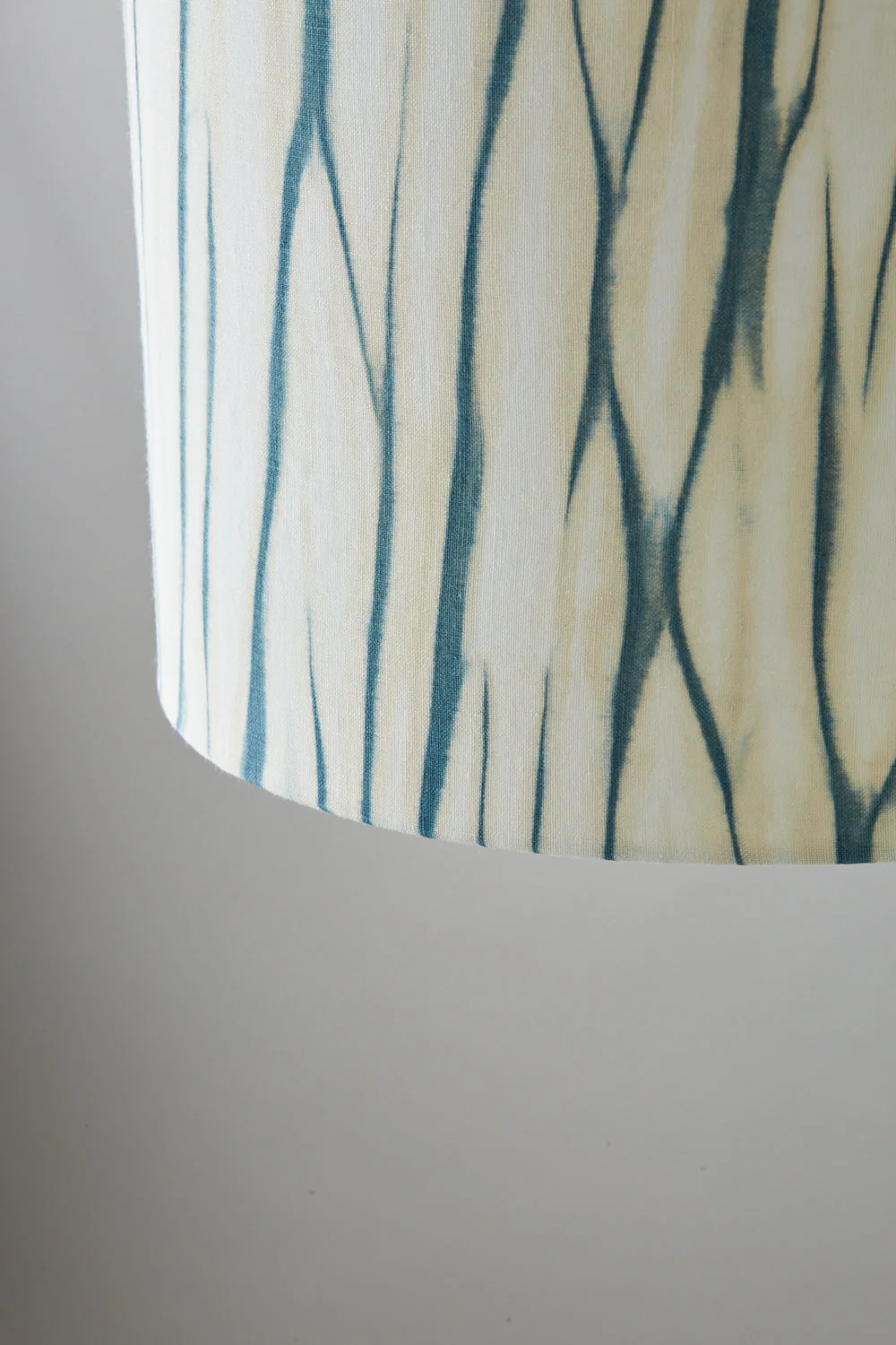 Teal green and gold arashi striped shibori lampshade - pendant ceiling unlit left side medium