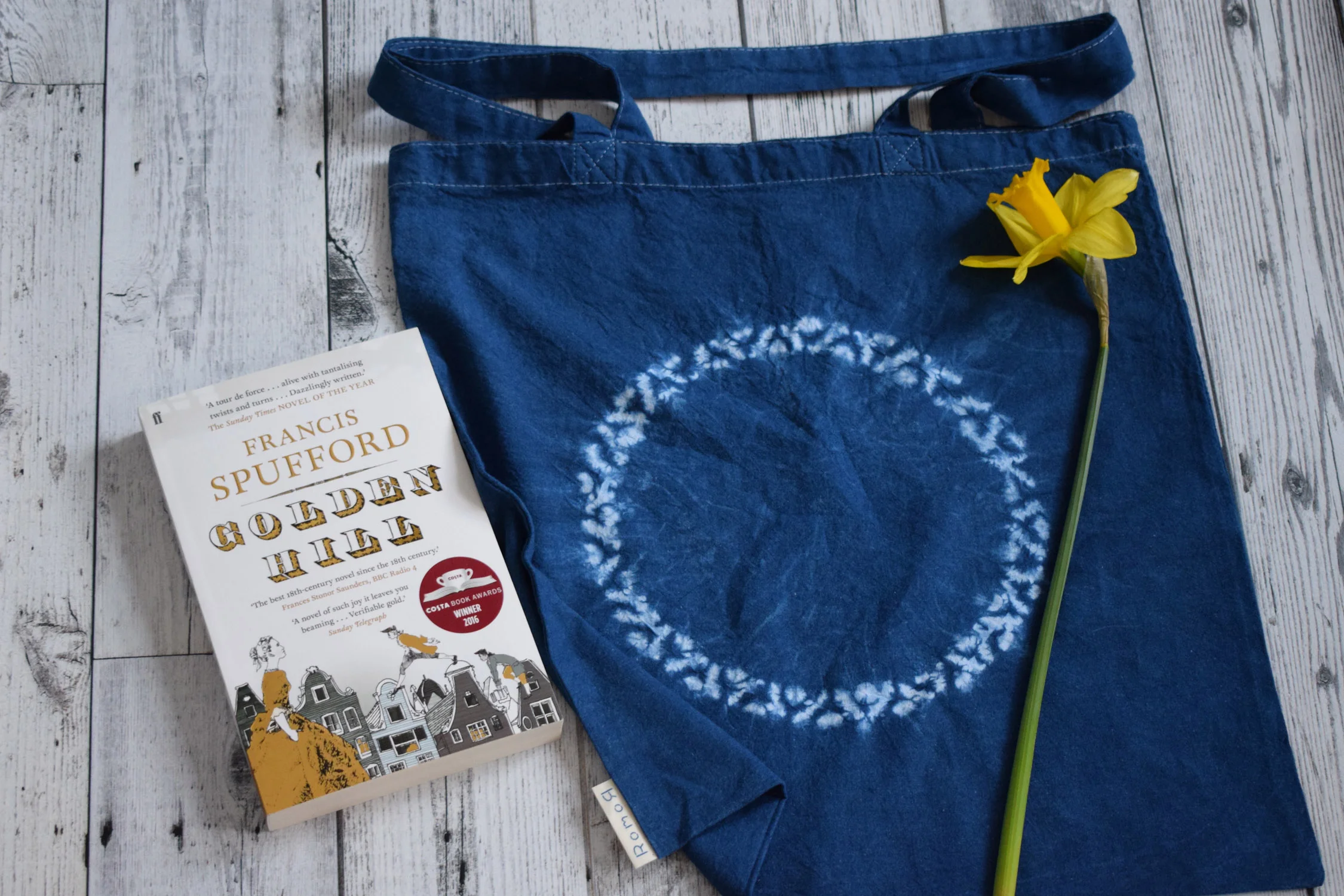 Romor Designs indigo tote - NIMBUS - NINBASU - on floor with book and daff.jpg