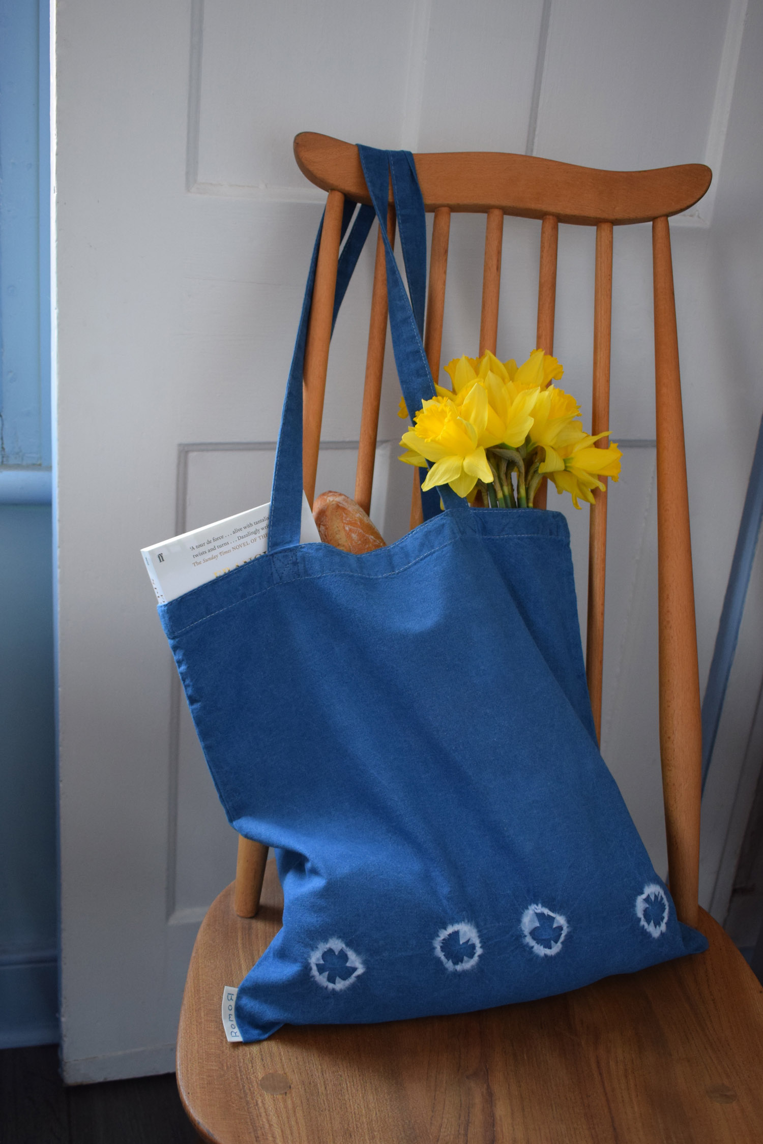 Romor Designs indigo tote - FLYING BIRDS - TOBUTORI - on chair filled.jpg