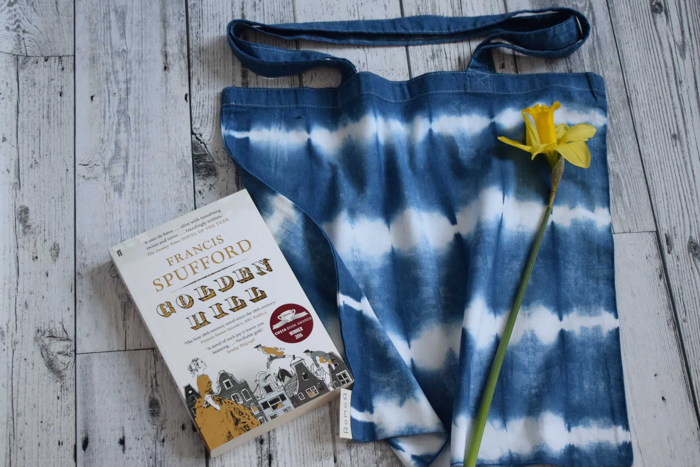 Romor Designs indigo tote - GRID - GURRIDO - on floor with book and daff.jpg