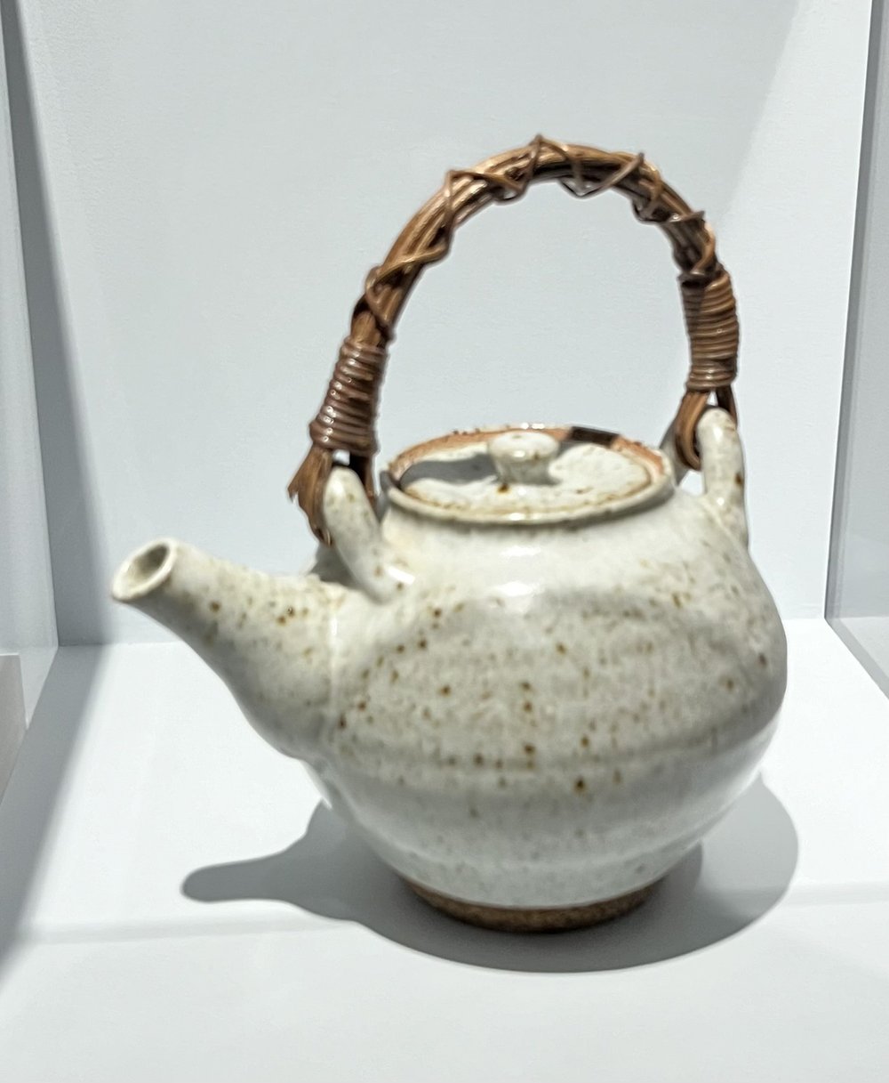 Mingei exhibition - April 24 - White glazed tea pot with bamboo basket handle.jpg