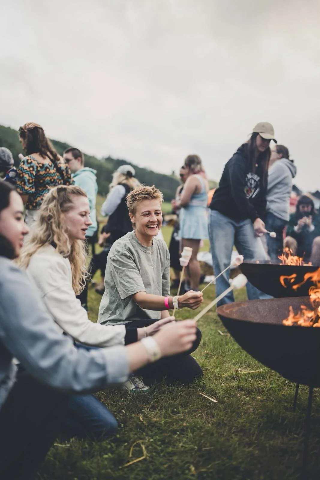 Toasting marshmallows around the camp fire