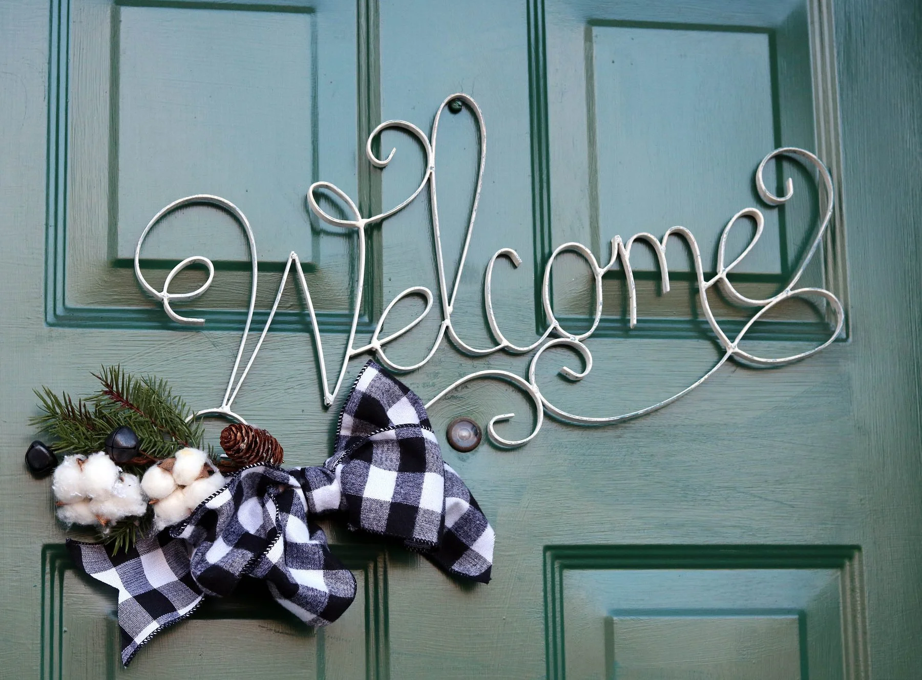 Jessica Caudill “Day 5- I'm slowly transitioning from Christmas to winter... I'm getting there! I found this metal sign in a "free" box beside the road (much to my husband's chagrin and dismay) and added a little winter greenery.”