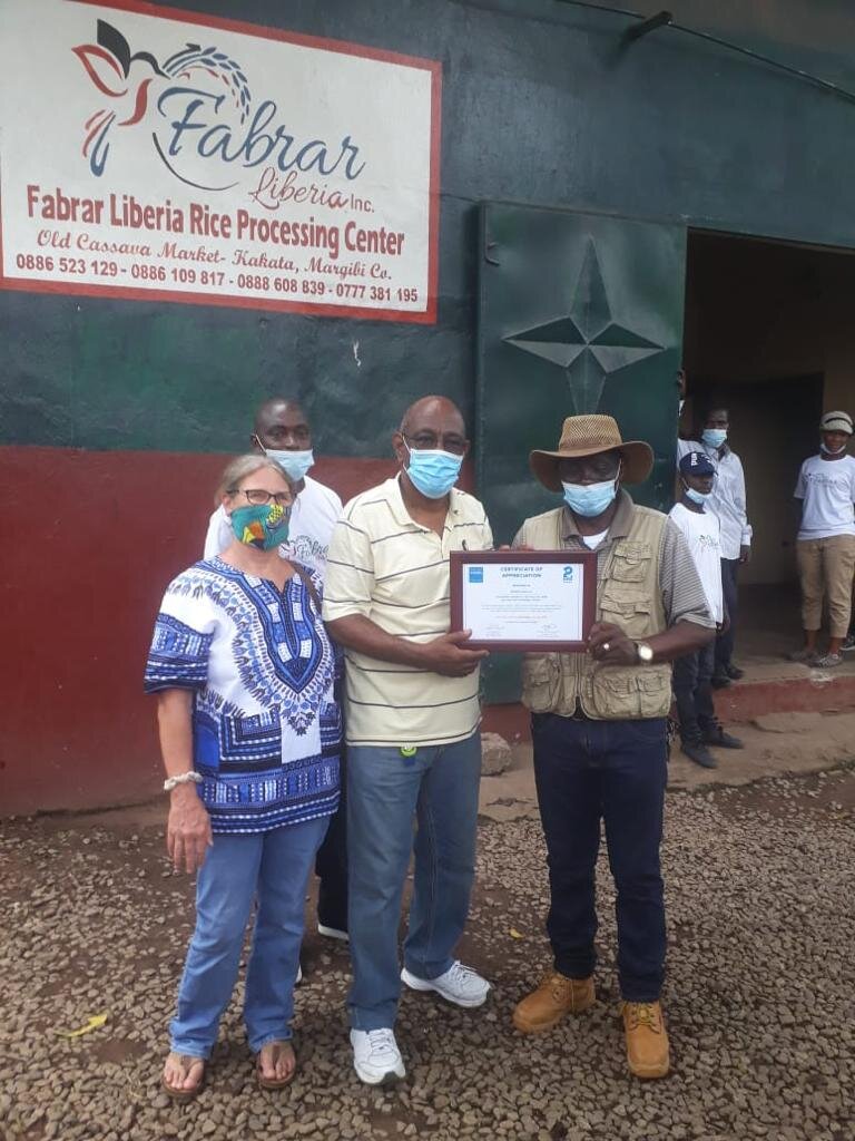  Ms Paula Nawrocki of Mary's Meals Country Director Paula Nawrocki visiting our processing center in Kakata to present a certificate of appreciation to FABRAR Liberia 