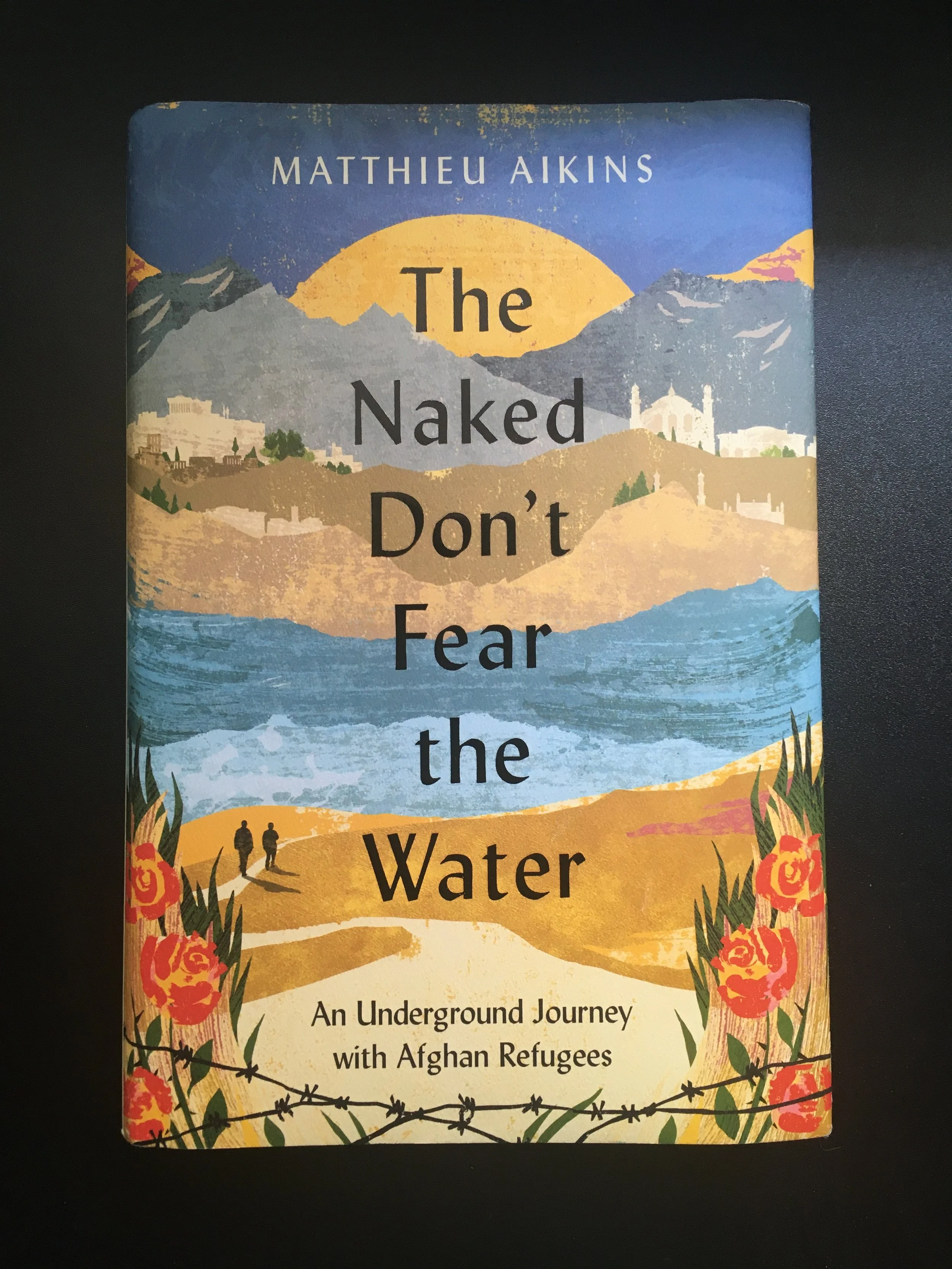 ITEM # 12; SIGNED COPY OF  "THE NAKED DON'T FEAR THE WATER"  BY MATTHIEU AIKINS    (Copy)