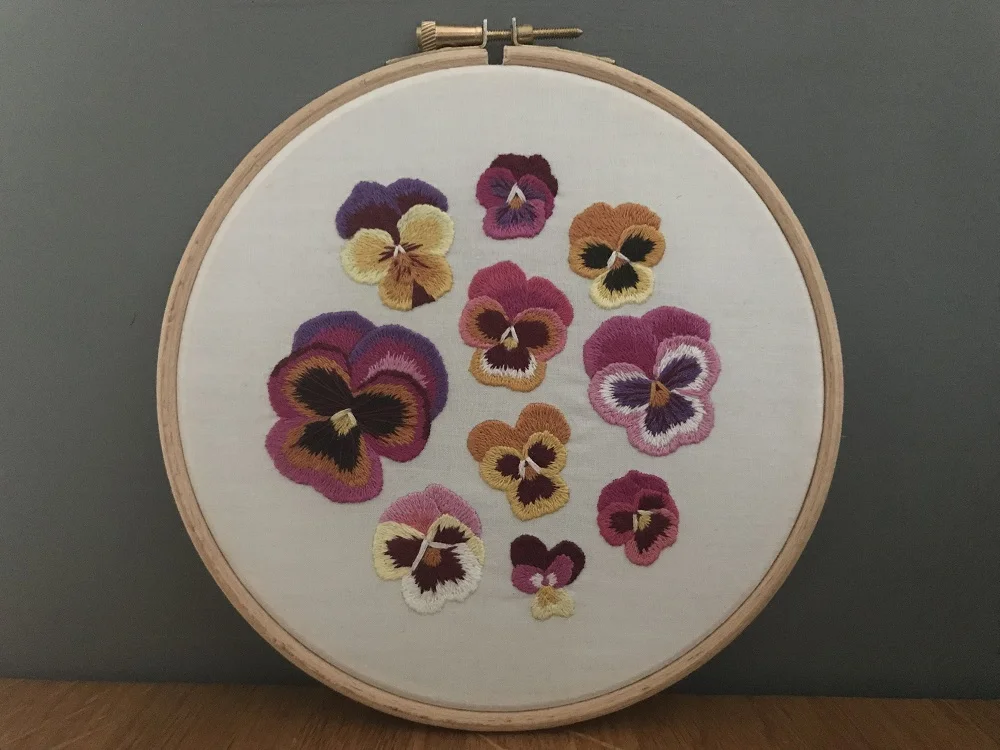 Pansy needle painting hoop art, design by Emillie Ferris.jpg