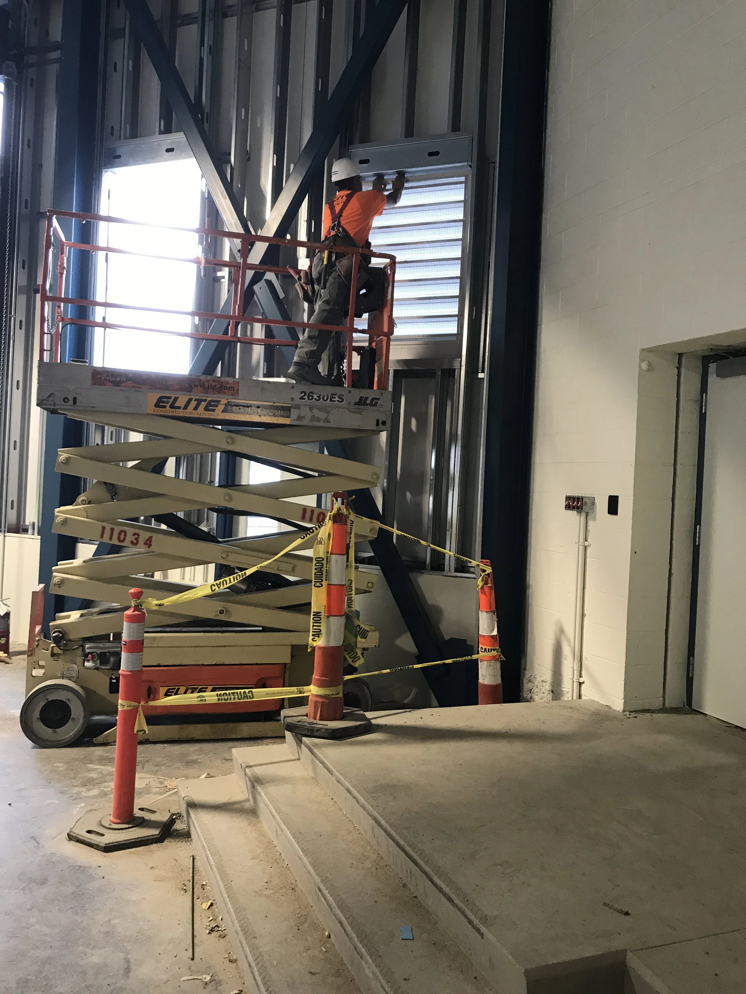 Waterbury DPW-guy on scissor lift.JPG