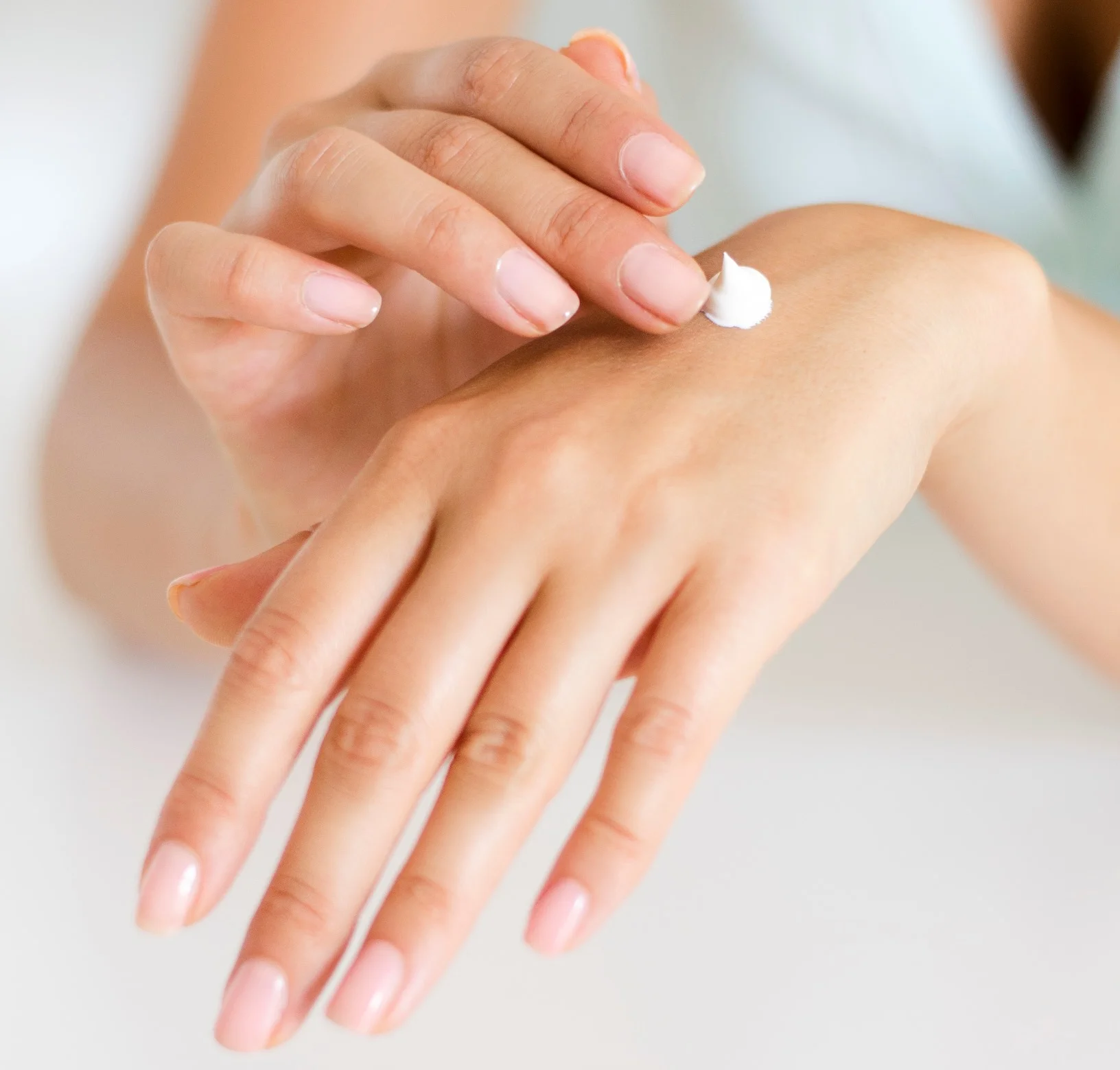 pretty hands apply moisturizer.jpeg