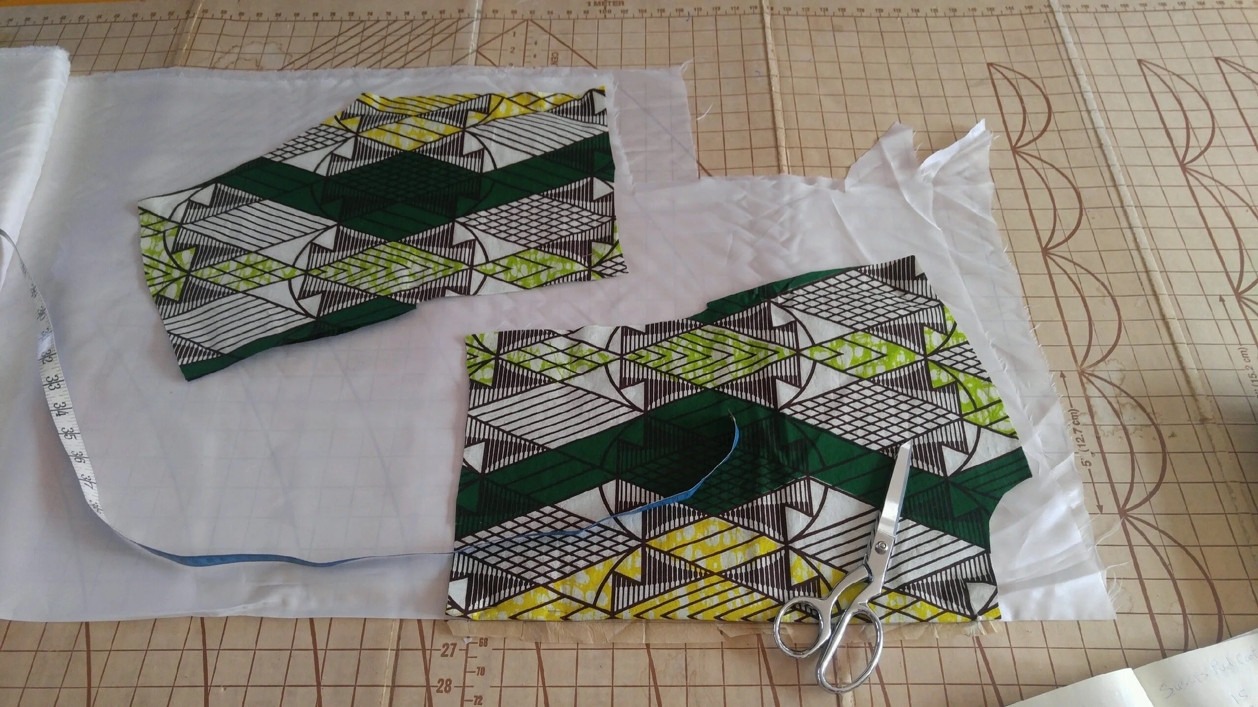 Our expert construction team takes the utmost care to not only line up patterns, but to strategically place fabric patterns to flatter our clients' unique figures.