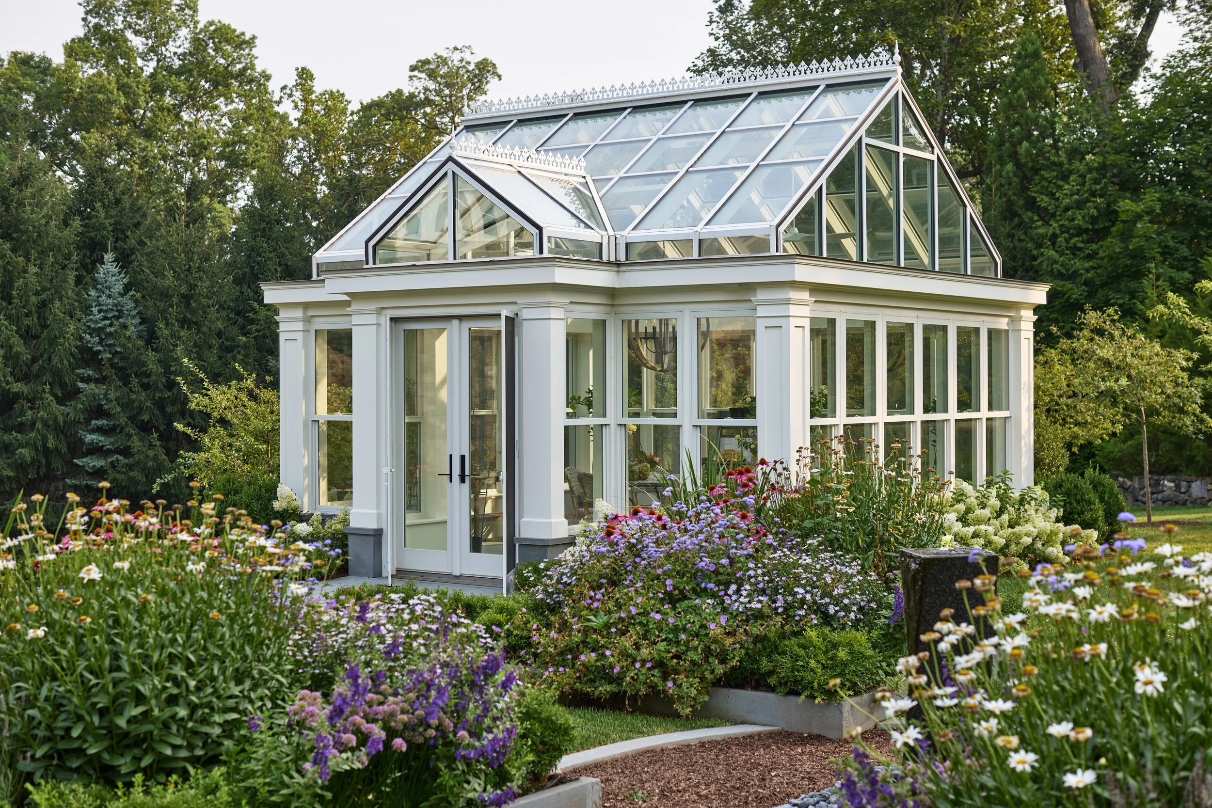  Charming greenhouse built for the homeowner’s green thumb.  