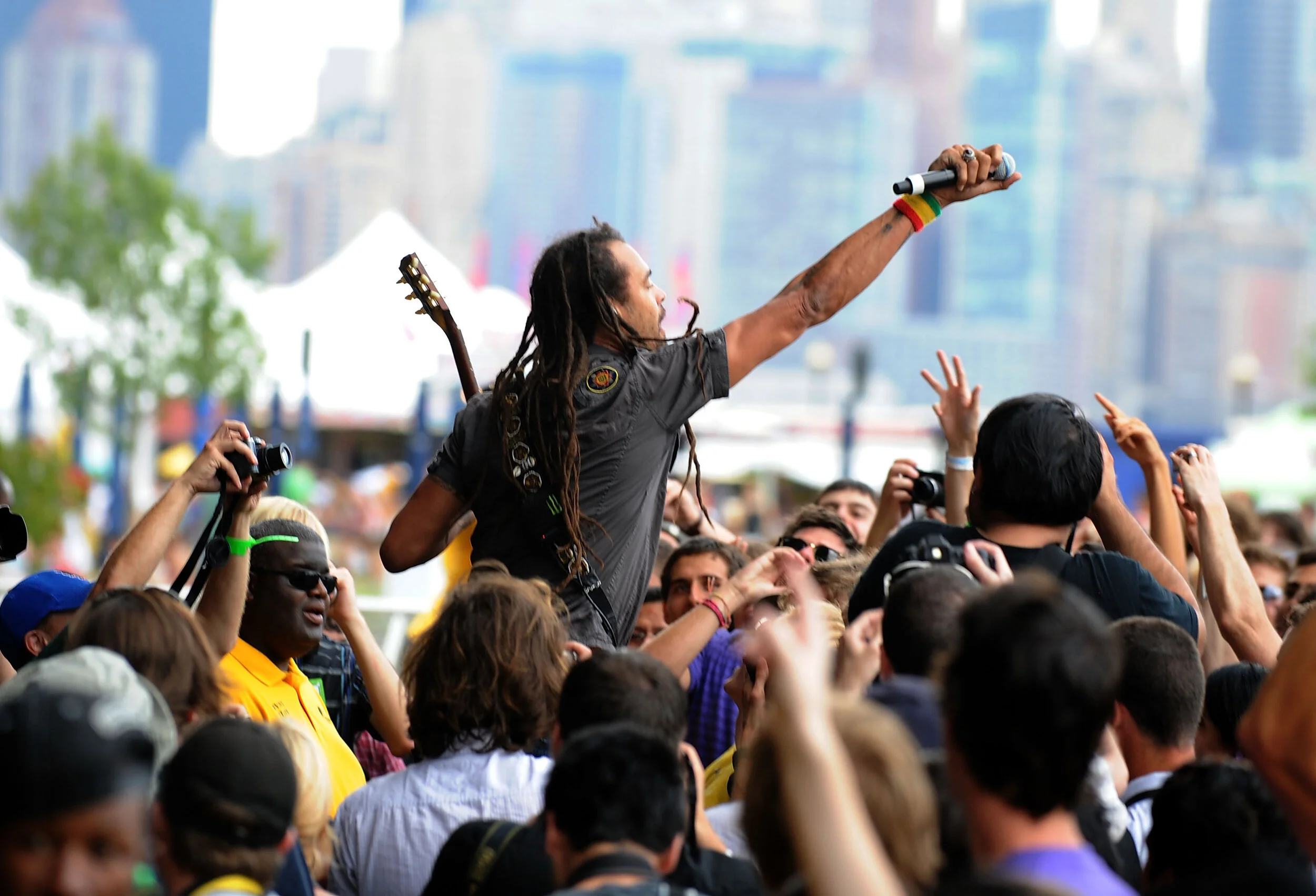 Michael Franti & Spearhead performs on stage during the 2008 All Points West music and arts festival at Liberty State Park on August 8, 2008 in Jersey City, New Jersey.2008 All Points West Music and Arts Festival - Day 1 - ShowLiberty State ParkJersey City, NJ United StatesAugust 8, 2008Photo by Jeff Kravitz/FilmMagic.comTo license this image (55450362), contact FilmMagic.com