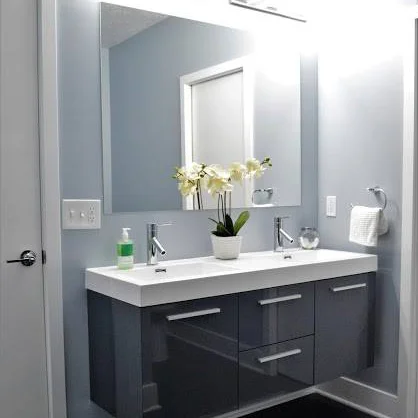 Steeltown Properties in Pittsburgh, Pennsylvania Offers Spacious, Updated Bathrooms with tiled showers, modern vanities, and artistic lighting fixtures
