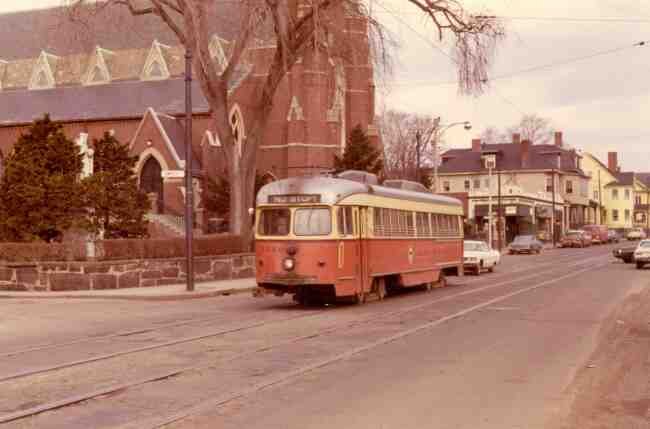 Trolley # 3326 can be seen traveling between Saint Joseph St. and Jamaica St. in front of Saint Thomas Aquinas Church in this 1971 photo.