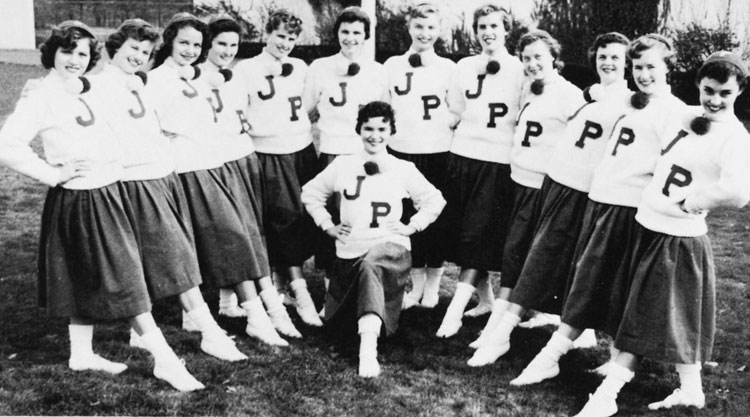 Cheerleaders of the Jamaica Plain High School in 1956. From the JPHS yearbook.