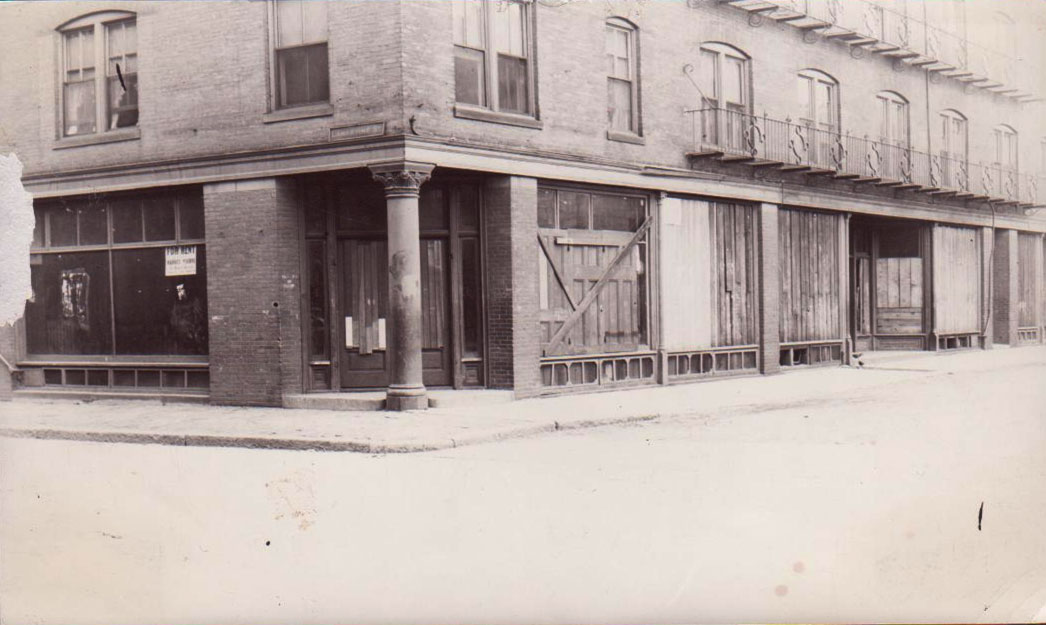  An early Jamaica Plain library, known as a deposit station since books were placed there on deposit for the public to borrow, is shown in this undated photograph. The branch opened at the corner of Lamartine and Paul Gore Streets in 1897. Photograph