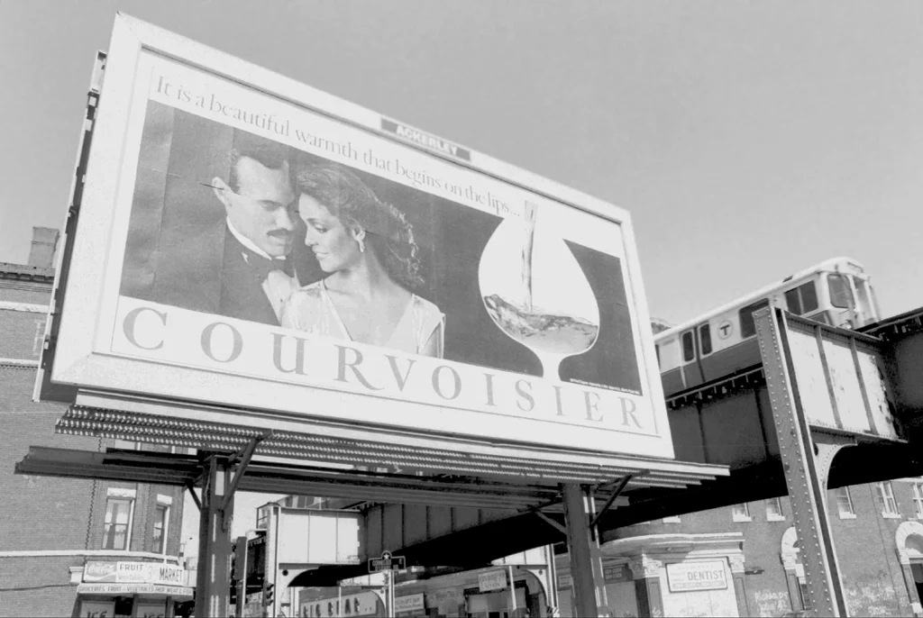 A view just outside of Egleston Square Station, at the corner of Washington and School Streets. Photograph courtesy of Chris Lovett, Neighborhood Network News. circa 1987.