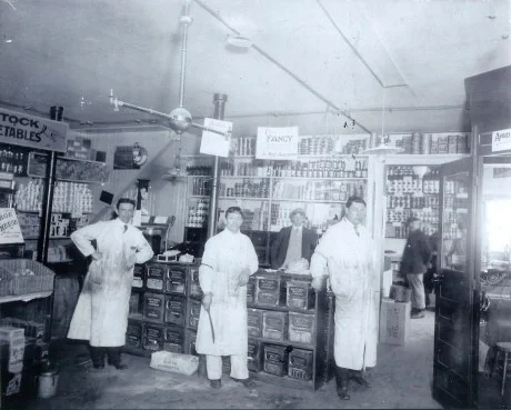 The Patterson family store selling groceries on Jamaica St. Photograph courtesy of the Patterson family. A higher resolution version of this photograph is available .