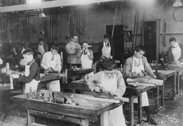 Boys mastering woodworking skills, 1919. Photograph by Lewis W. Hine. Courtesy of the Library of Congress.