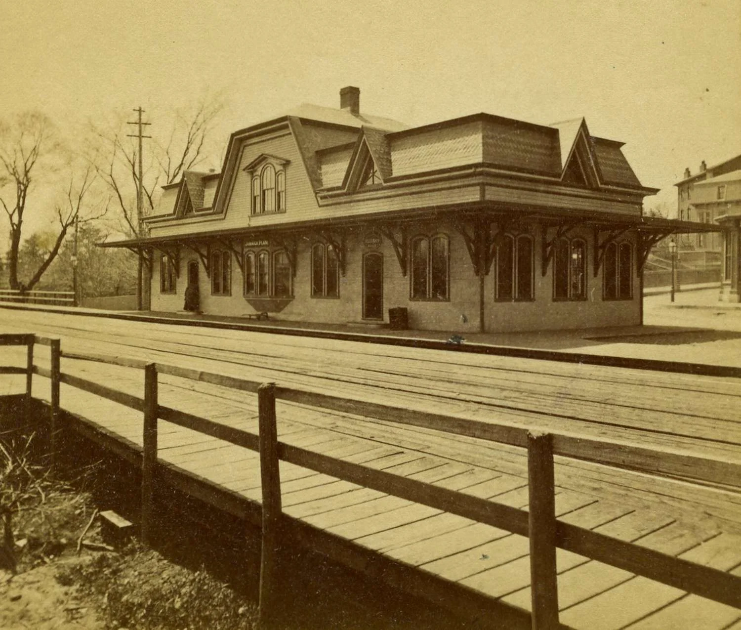 An image of the Jamaica Plain Station before the Boston & Providence Railroad embankment was constructed. Gordon Street can be seen to the right rear of the station. The new incarnation of this stop is Green Street MBTA station on the Orange Line. Courtesy of Greg French.
