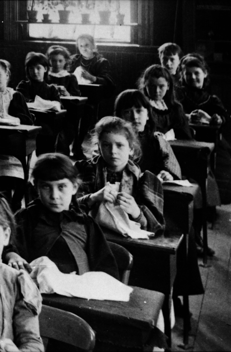  View of children in classroom.&nbsp; School is thought to be in the vicinity of Boylston Station, Jamaica Plain.&nbsp; Photograph courtesy of Emy Thomas. Higher resolution versions of photographs in this set are  available .﻿﻿ 