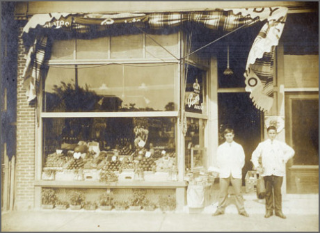  Bob Ristuccia (left) stands in front of Bob’s Spa, 128 South Street, circa 1912.&nbsp;  Download  high resolution .tif file. 