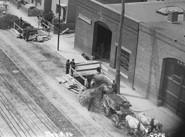  Looking southwest in 1906 down Washington Street from Green Street. Excavations are under way for the construction of the elevated railway (the old Orange line) that will run down Washington Street. This is an enlargement of a portion of another ima
